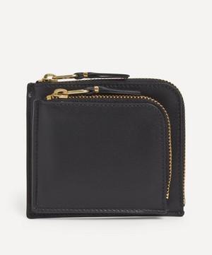 Comme Des Garçons - Outside Pocket Line Zip Around Leather Wallet image number 0
