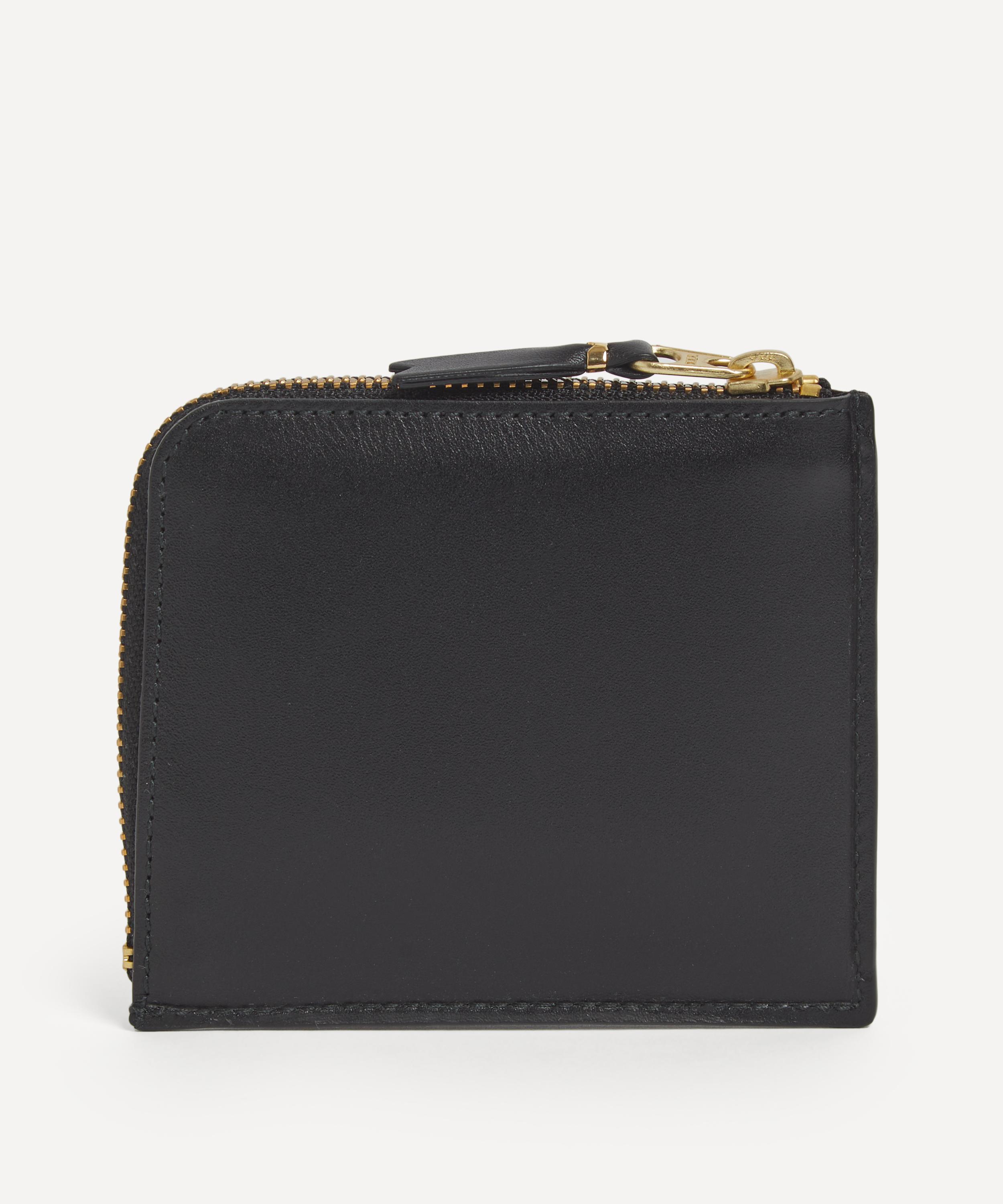 Comme Des Gar ons Outside Pocket Line Zip Around Leather Wallet