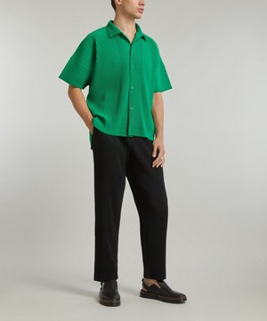 HOMME PLISSÉ ISSEY MIYAKE - Core Pleated Tapered Trousers image number 1