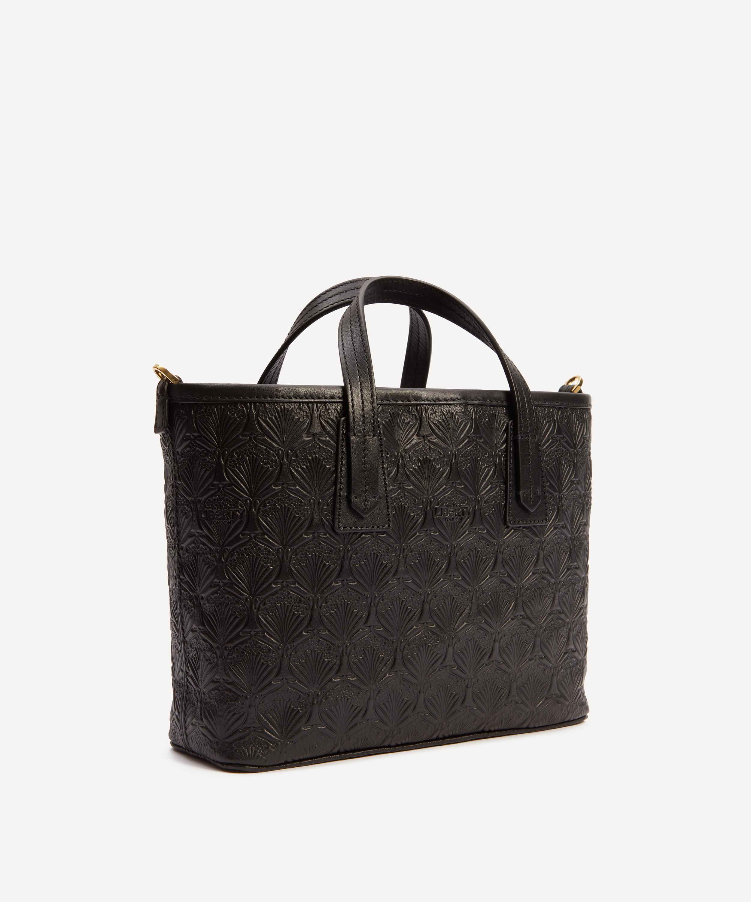 Small embossed all over logo shopper bag