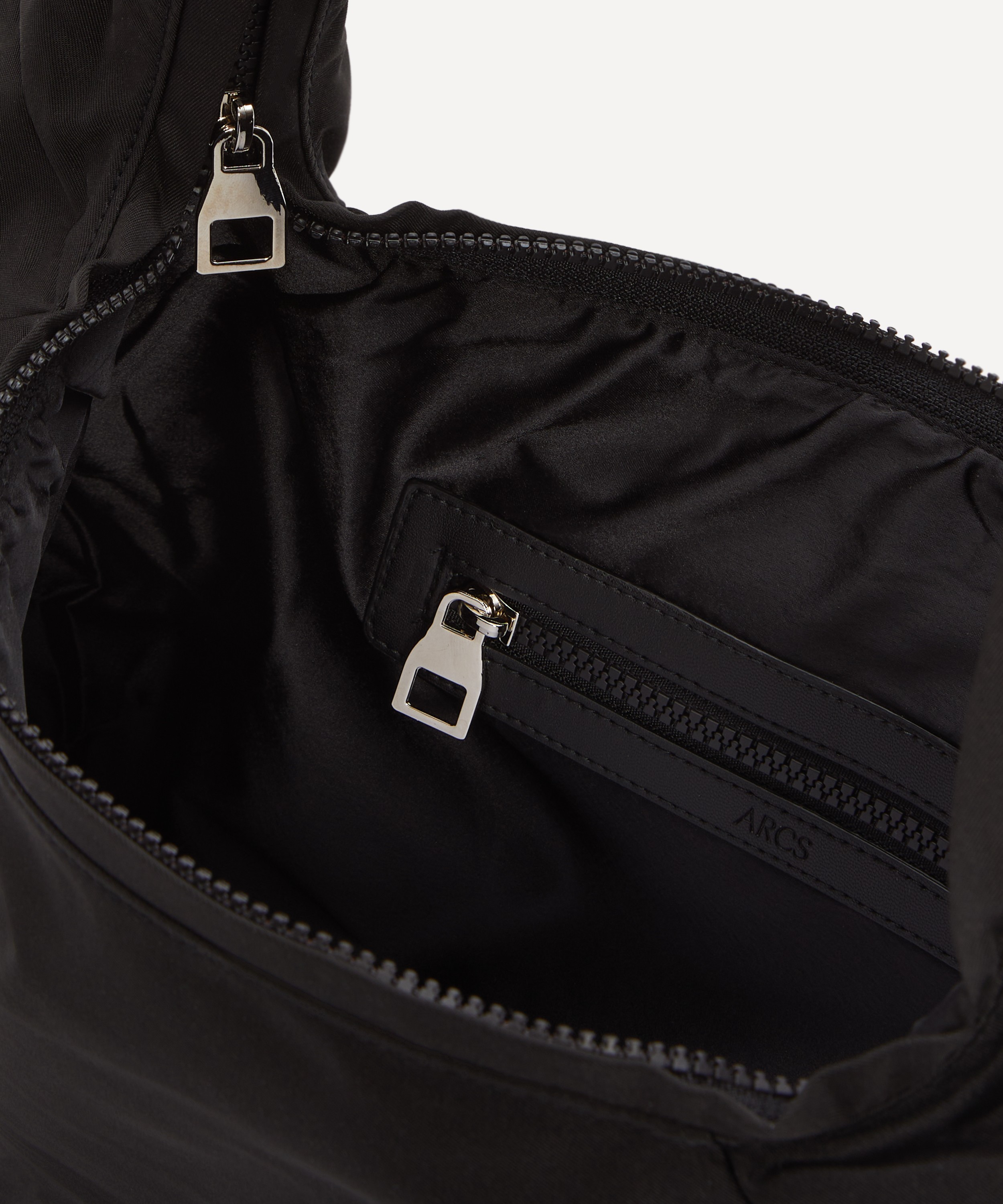 ARCS LITTLE HEY Sling Black Cross-Body Bag | Liberty