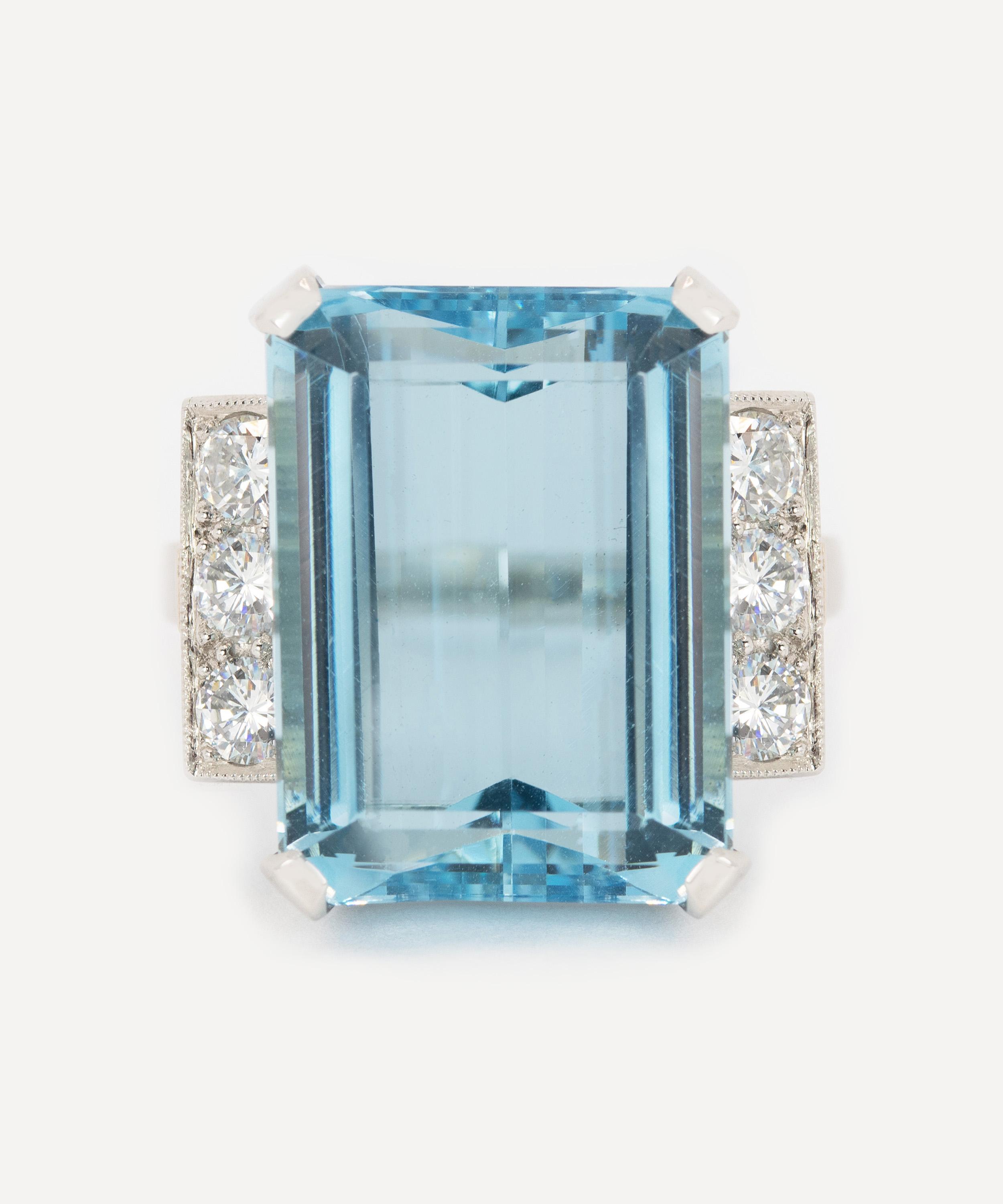 Emerald cut cocktail on sale ring