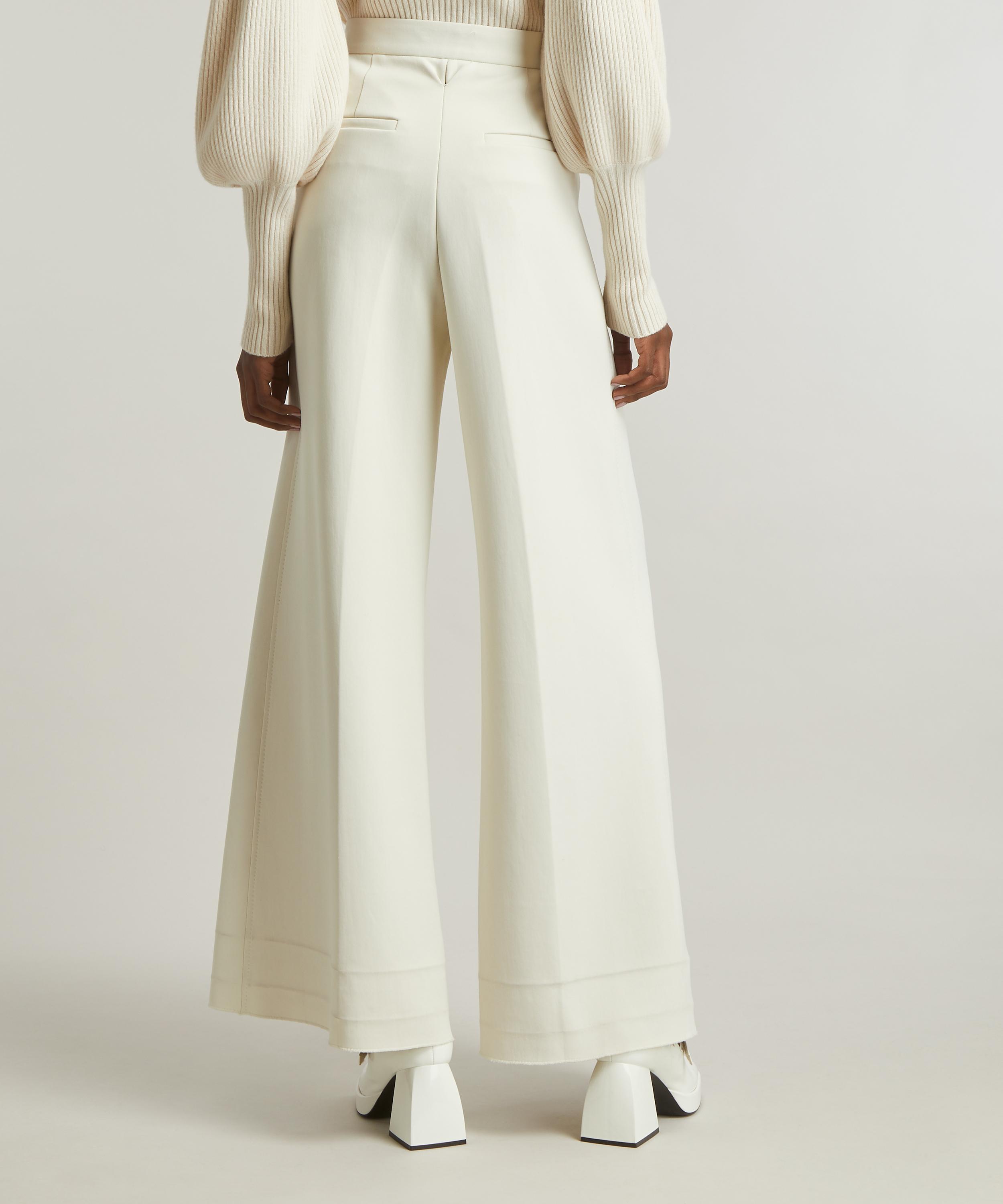 Flared jersey hot sale trousers