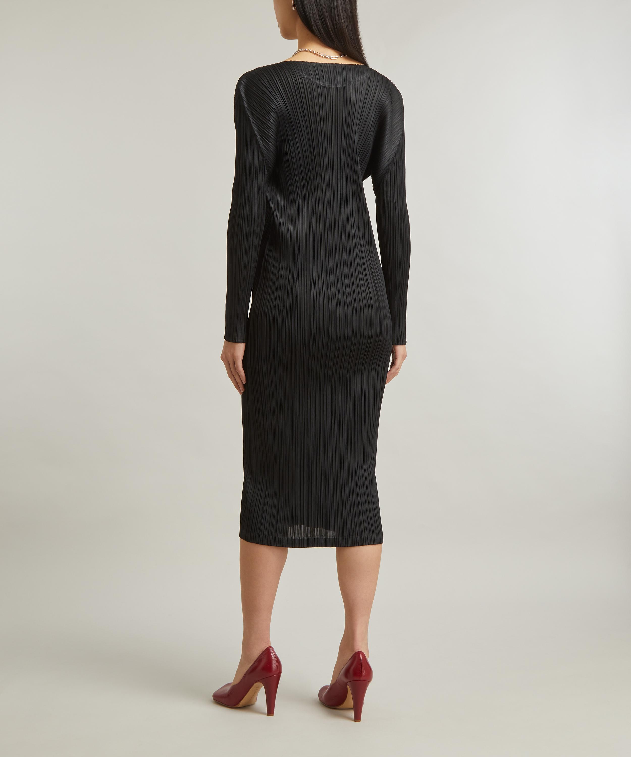 Black dress clearance with coloured pleats