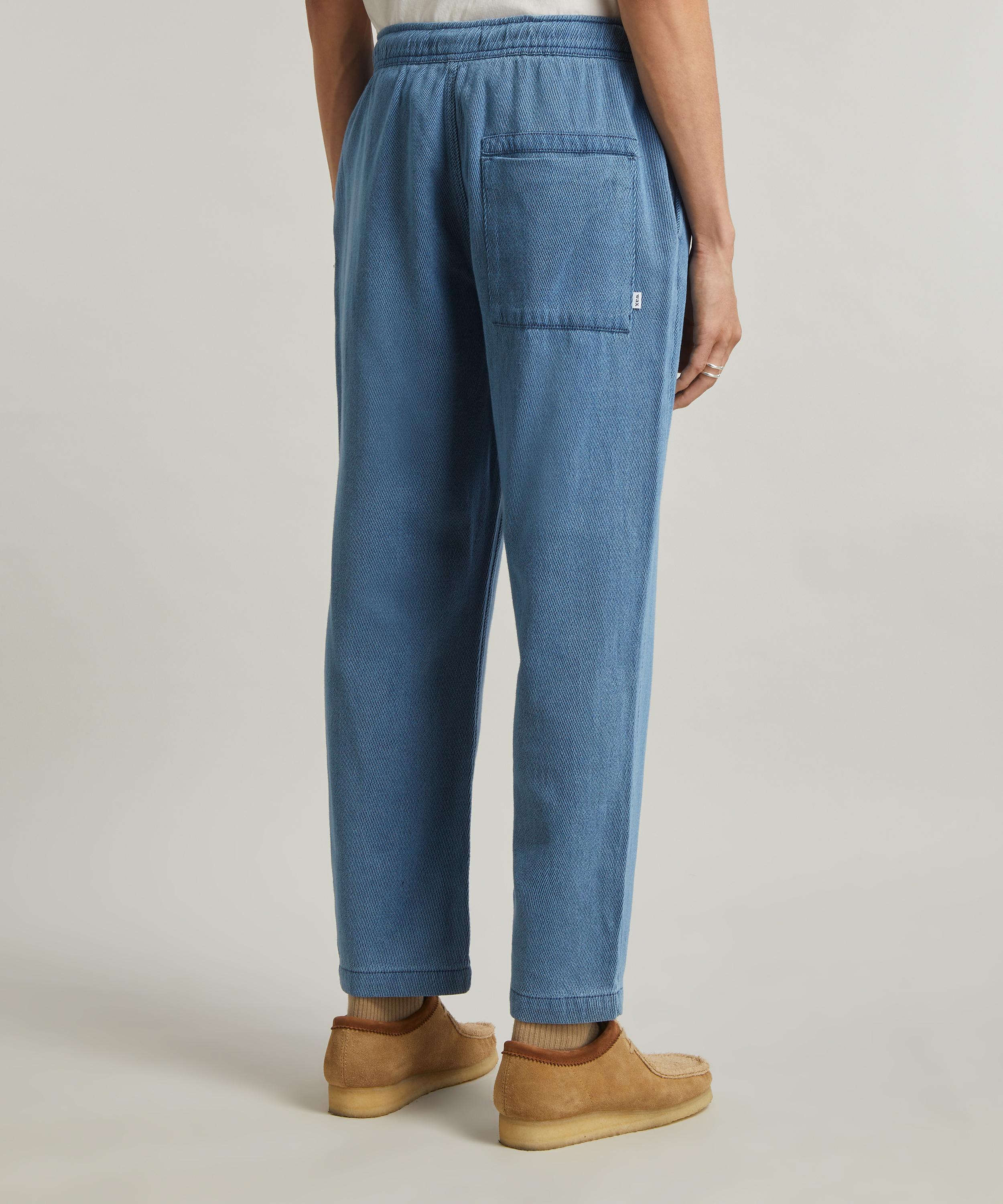Wax London Kurt Light Wash Indigo Trousers | Liberty