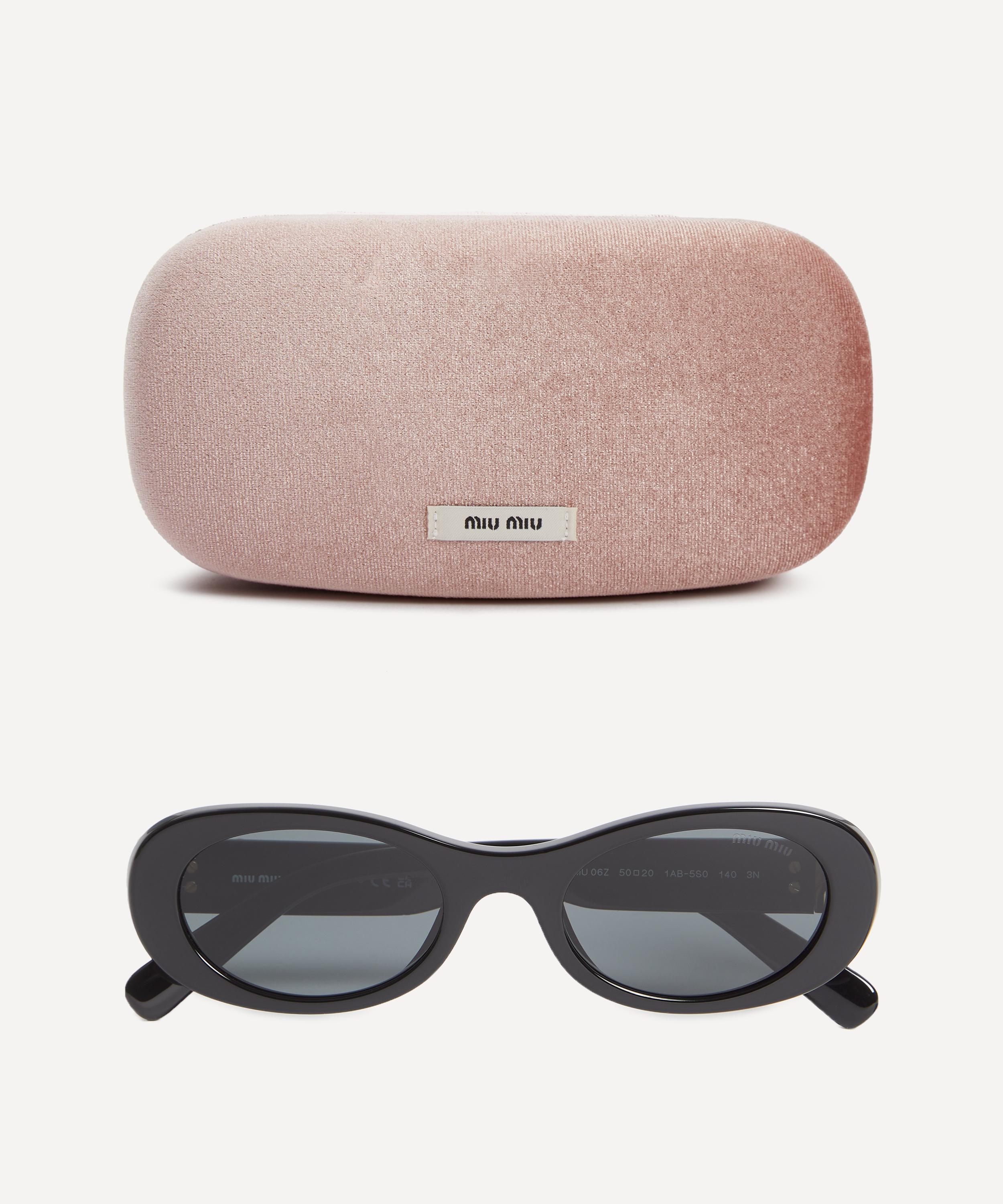 Miu Miu Oval Sunglasses