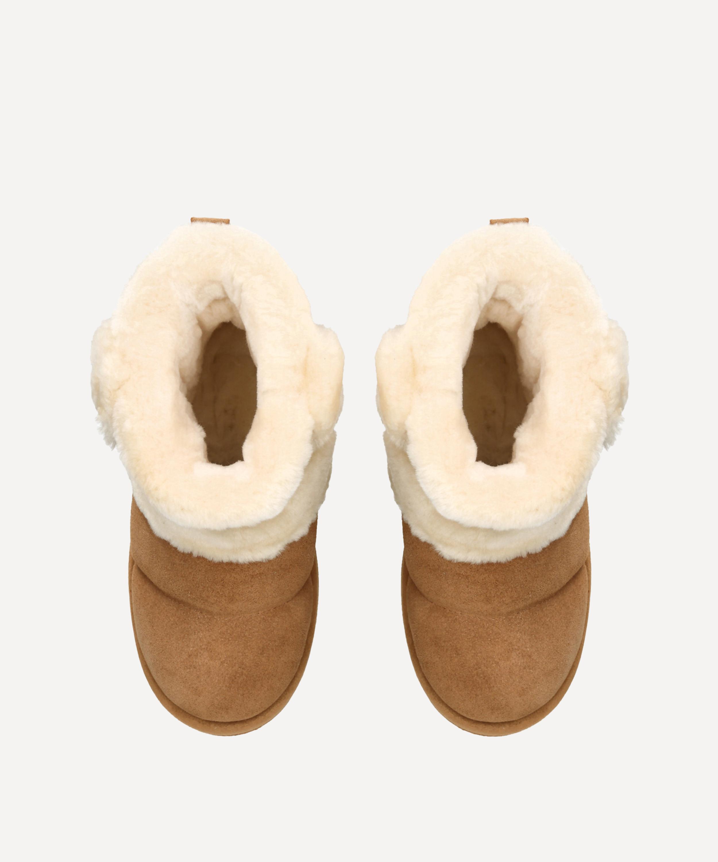 Tan uggs hot sale with fur