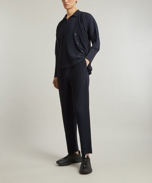 HOMME PLISSÉ ISSEY MIYAKE - Pleated Straight Leg Trousers image number 1