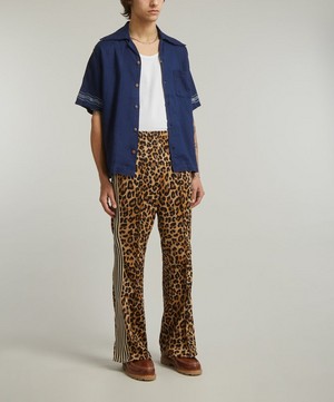 Kapital - Smooth Jersey Leopard STUNTMAN & WOMAN Track Trousers image number 1