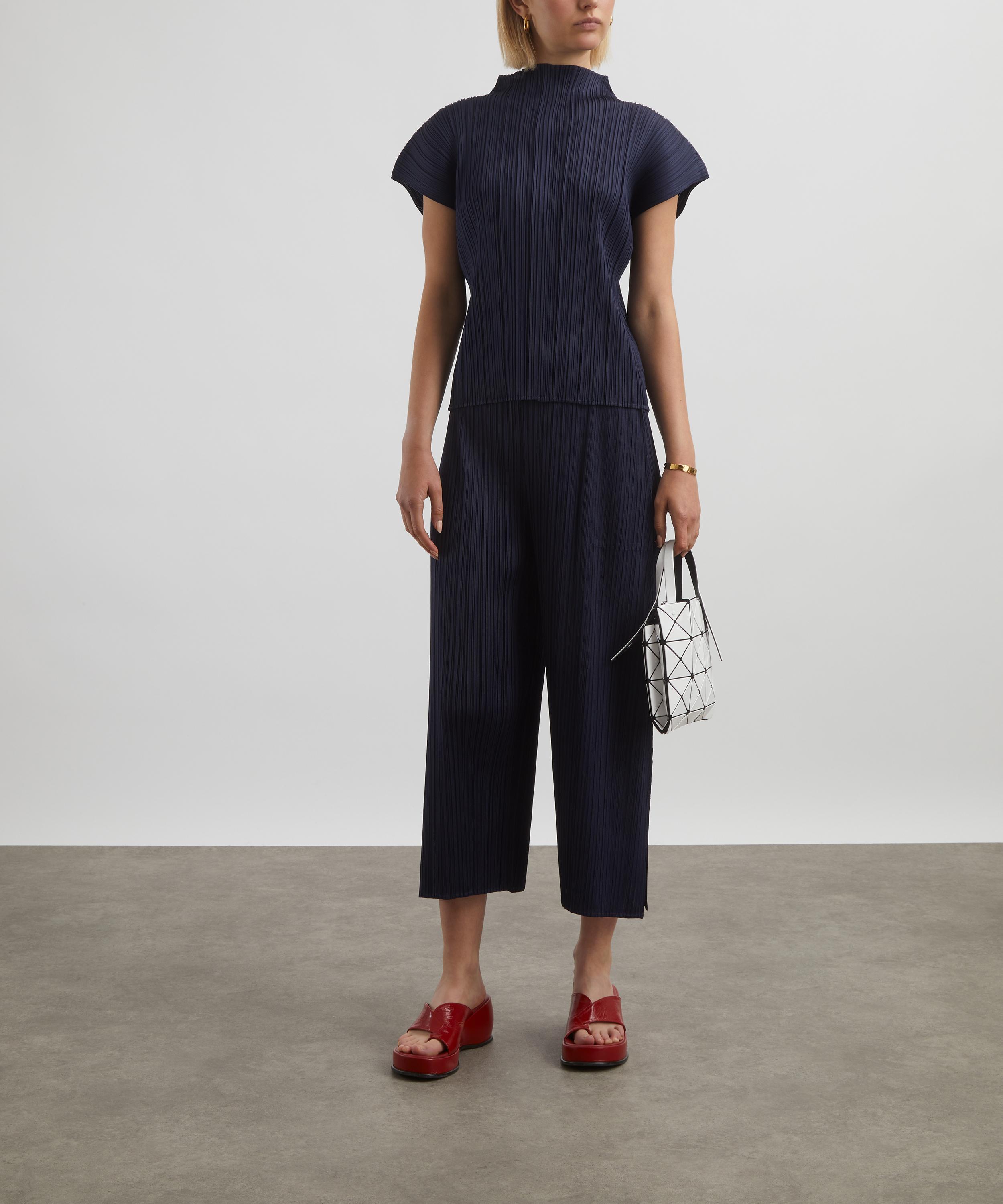 Pleats Please Issey Miyake - MONTHLY COLOURS JUNE Cropped Wide-Leg Pleated Trousers image number 1