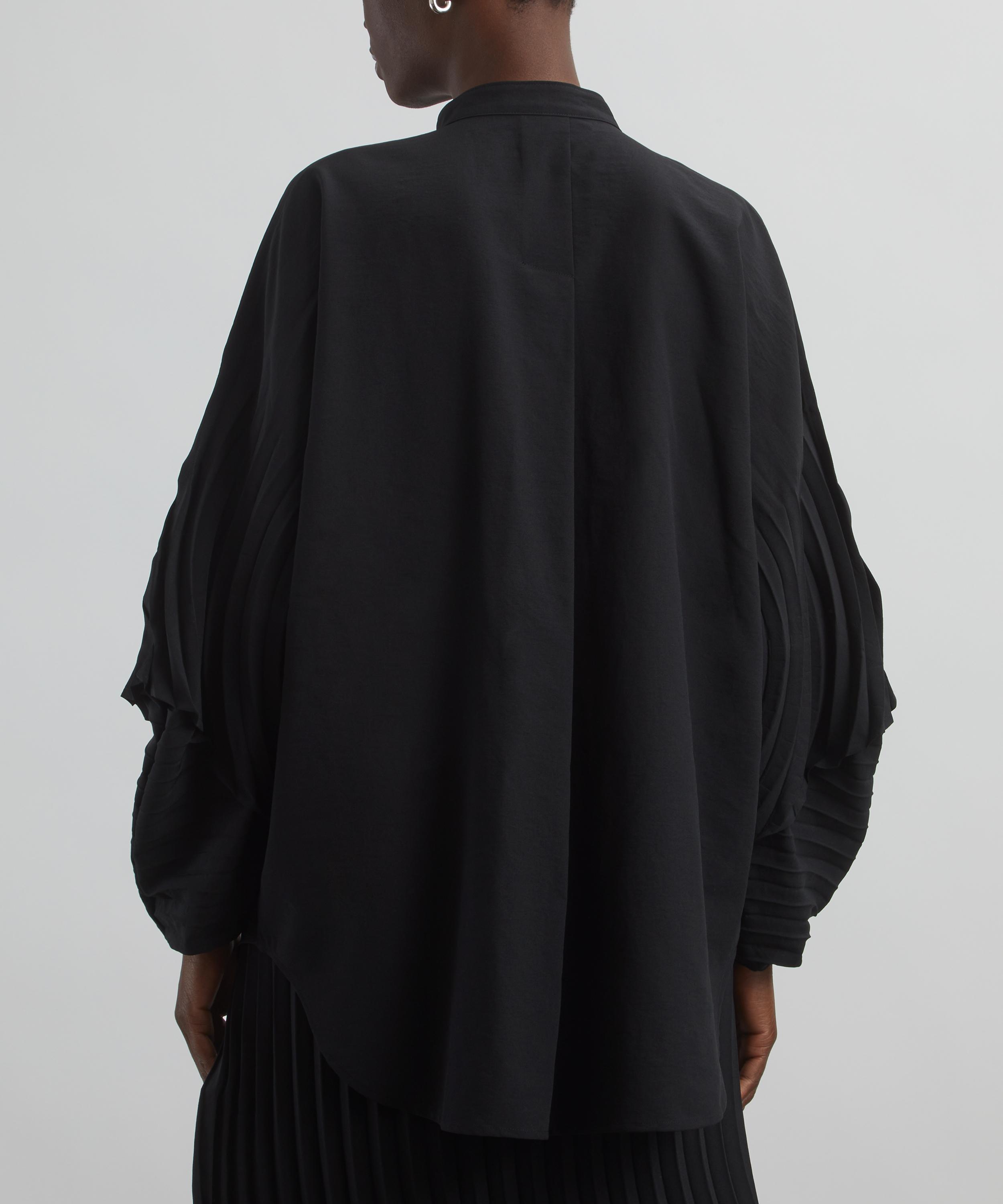 Issey Miyake - RESONANT PLEATS Knitted Midi Skirt image number 3