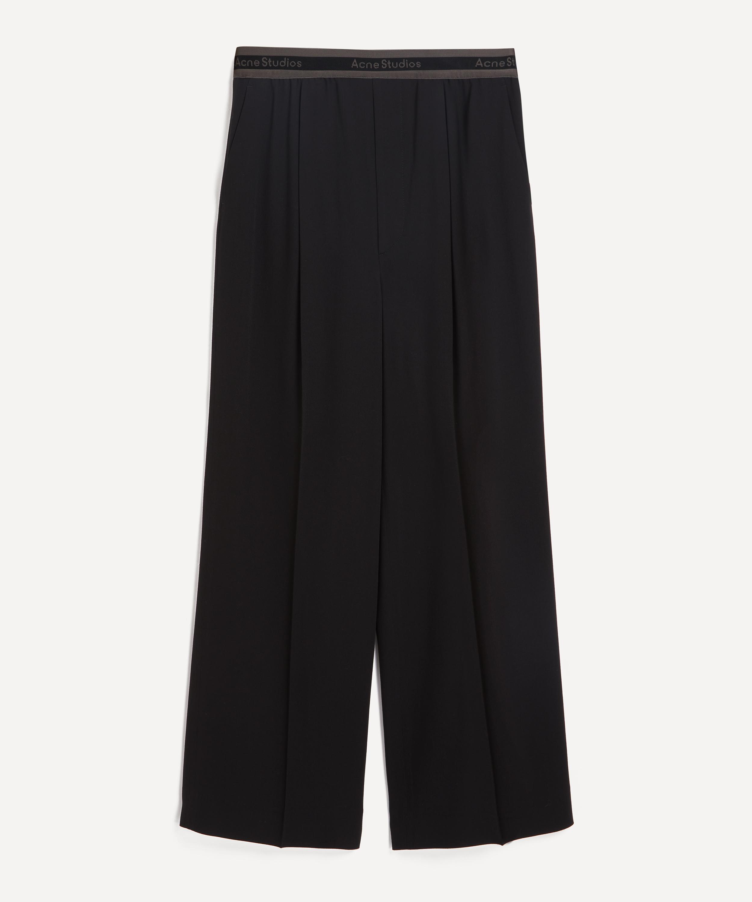 Acne Studios - Logo Tape Trousers image number 0