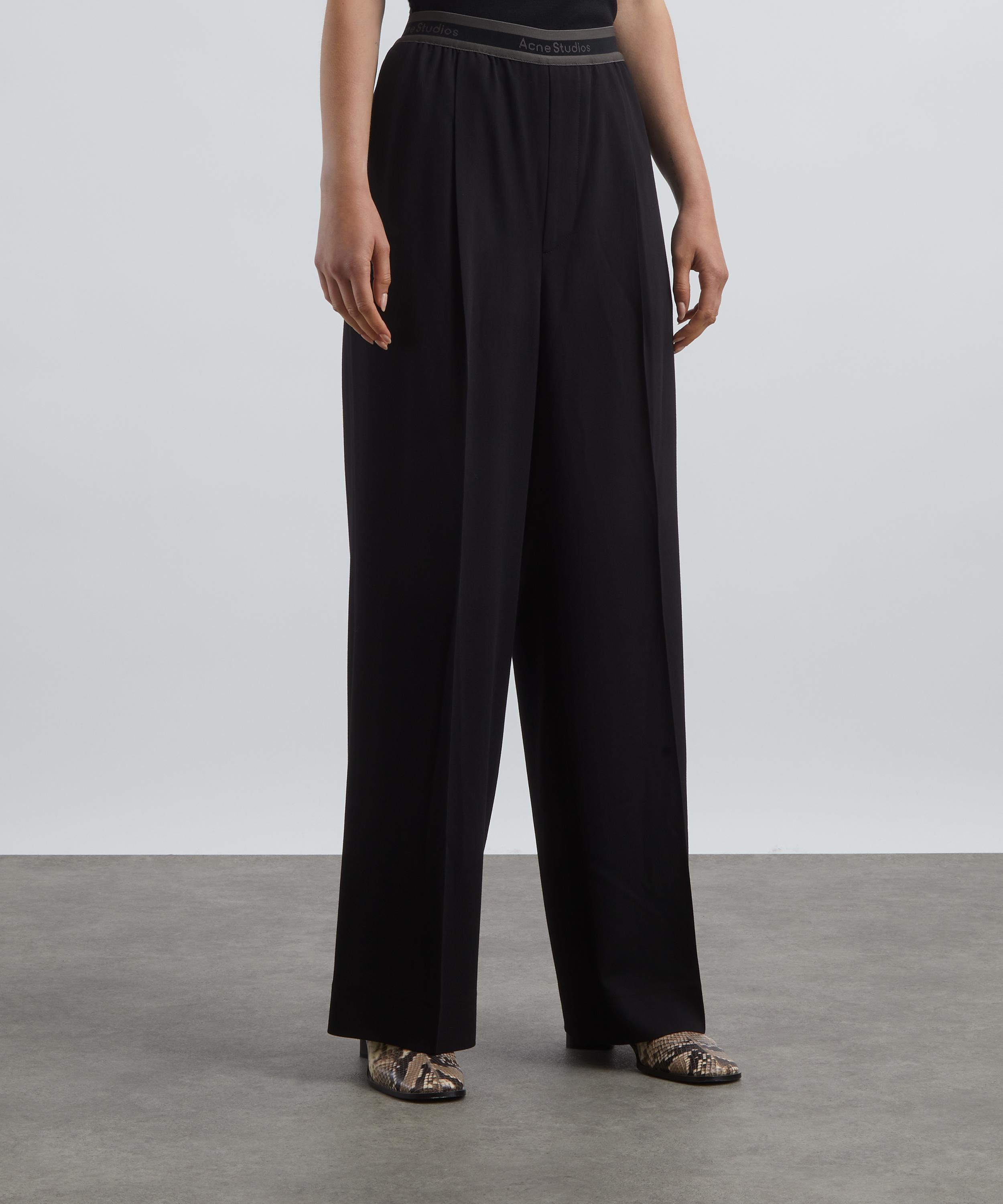 Acne Studios - Logo Tape Trousers image number 2