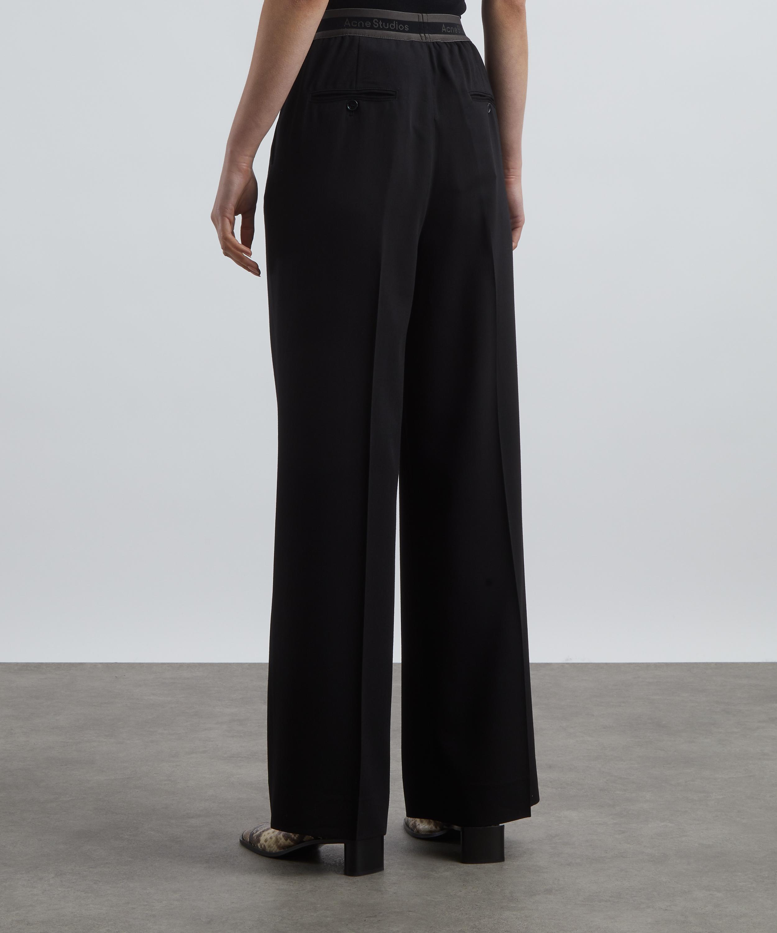 Acne Studios - Logo Tape Trousers image number 3