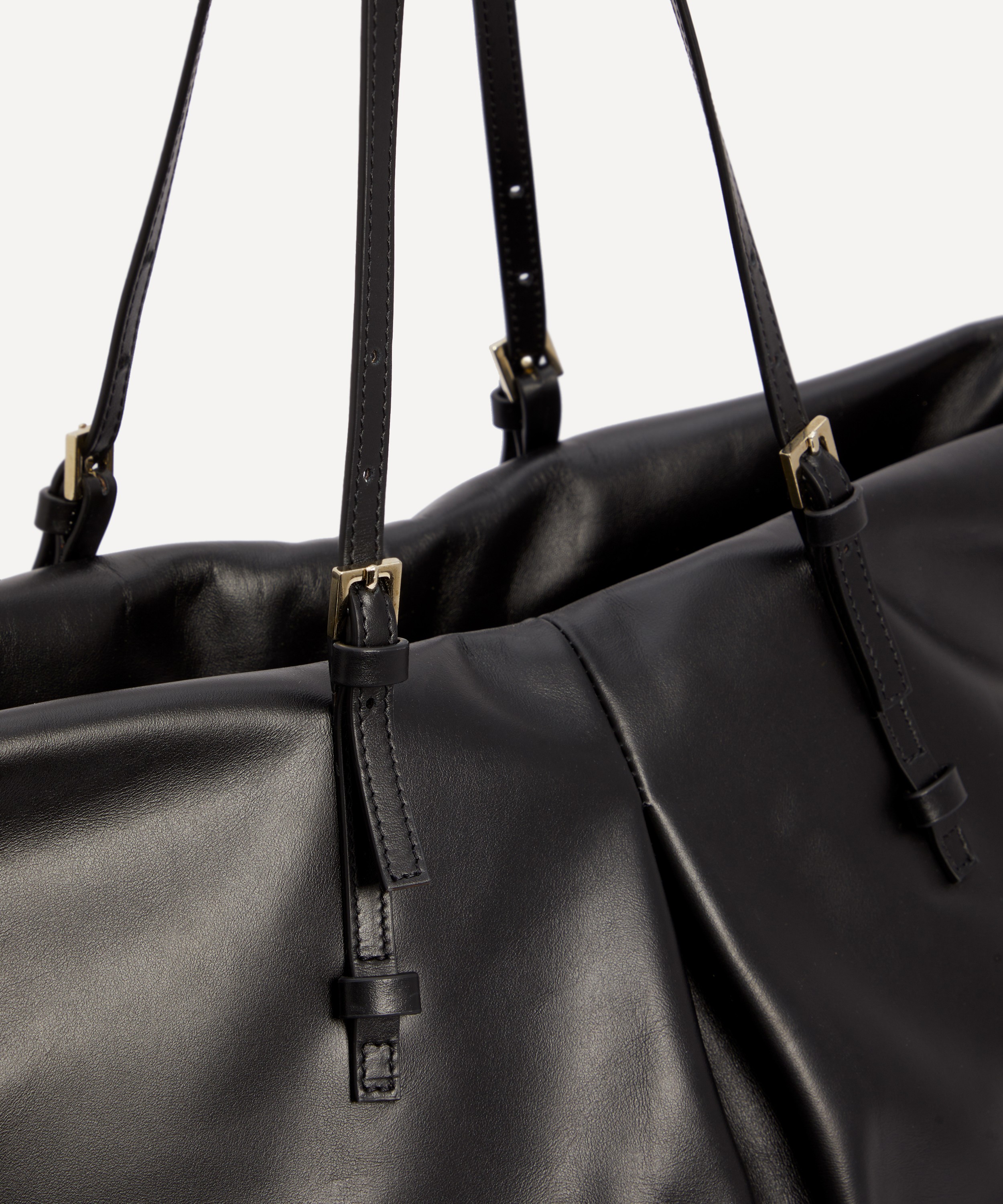 大西 MINIMAL LEATHER SHOULDER BAG 2926B East West Medium leather shoulder bag ALAIA - Nugnes1920