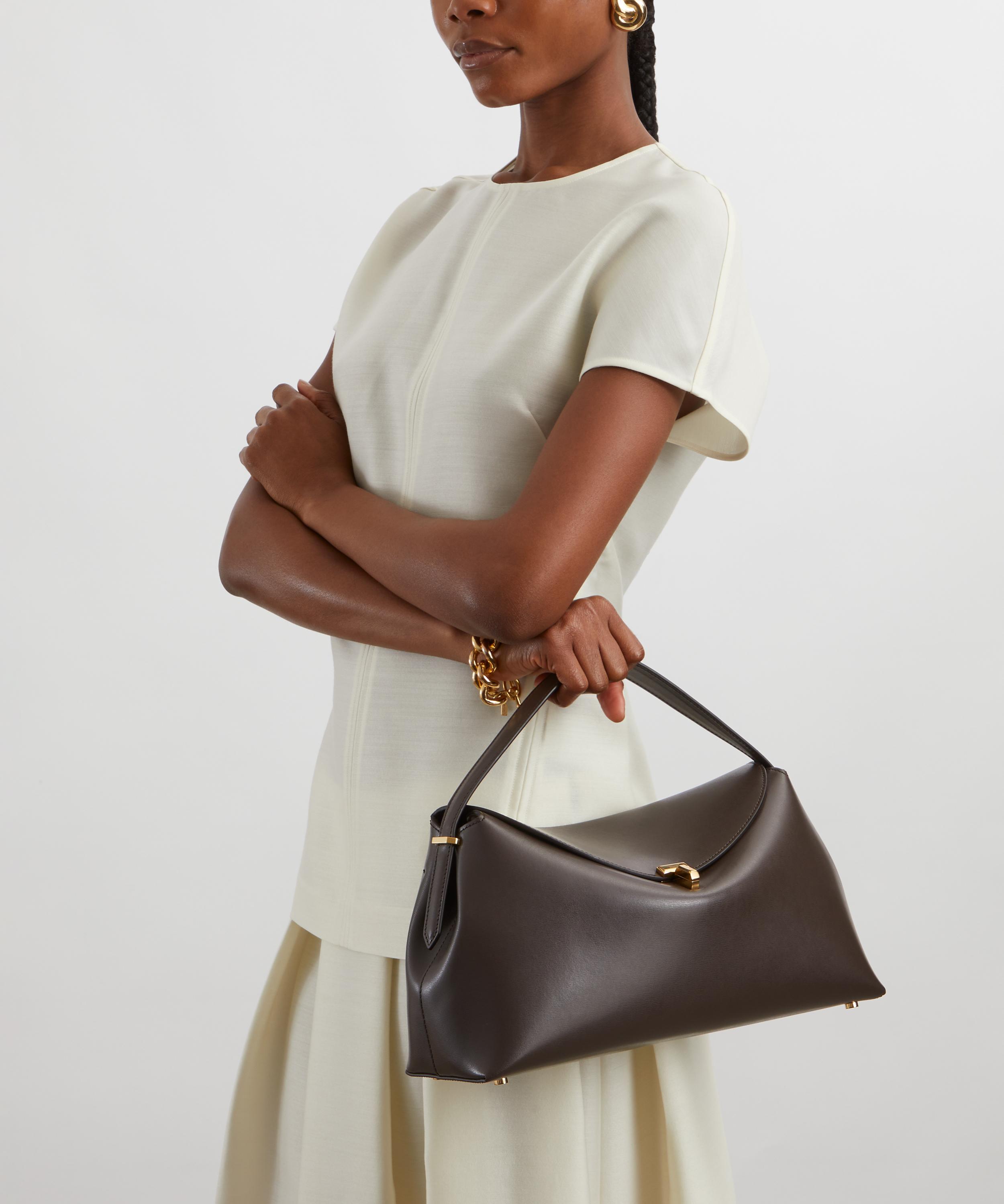 【Toteme】T-Lock ハンドバッグ バークブラウン 送料関税込 TOTEME T-lock Clutch Bag | Brown | FARFETCH