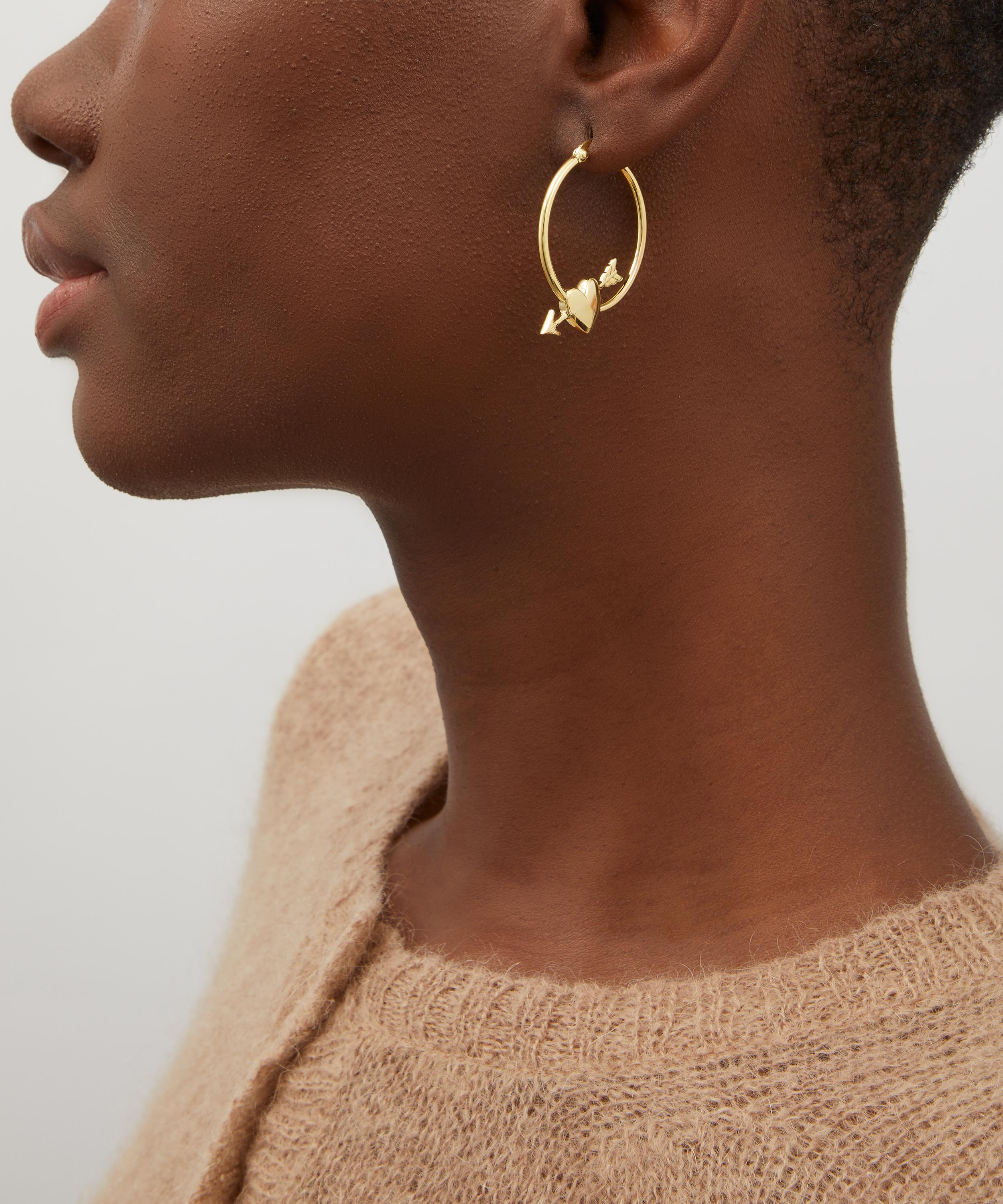 Anna + Nina - x Liberty Gold-Plated Arrowed Heart Hoop Earrings image number 1