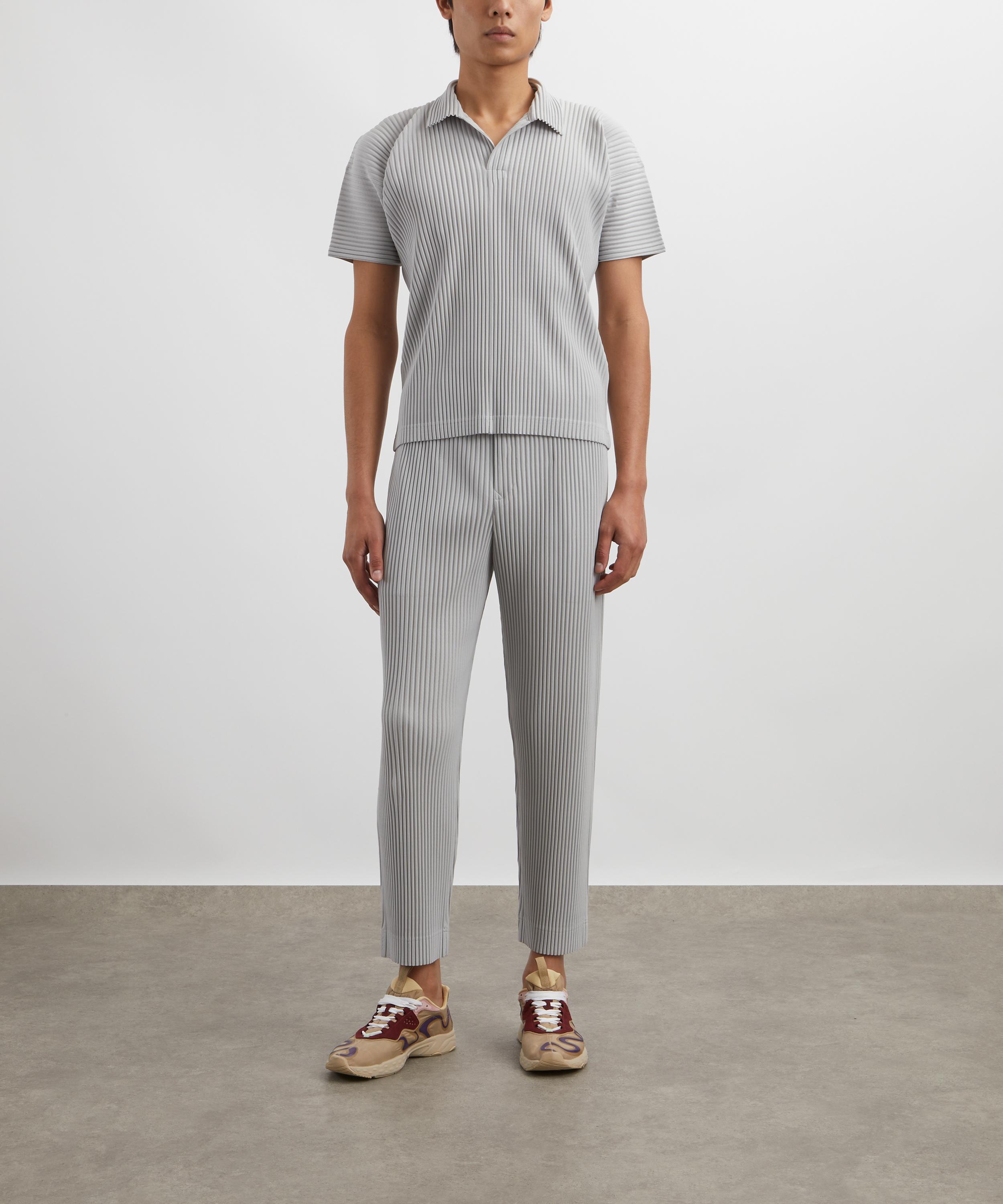 HOMME PLISSÉ ISSEY MIYAKE - OCTOBER BASICS Pleated Polo Shirt image number 1