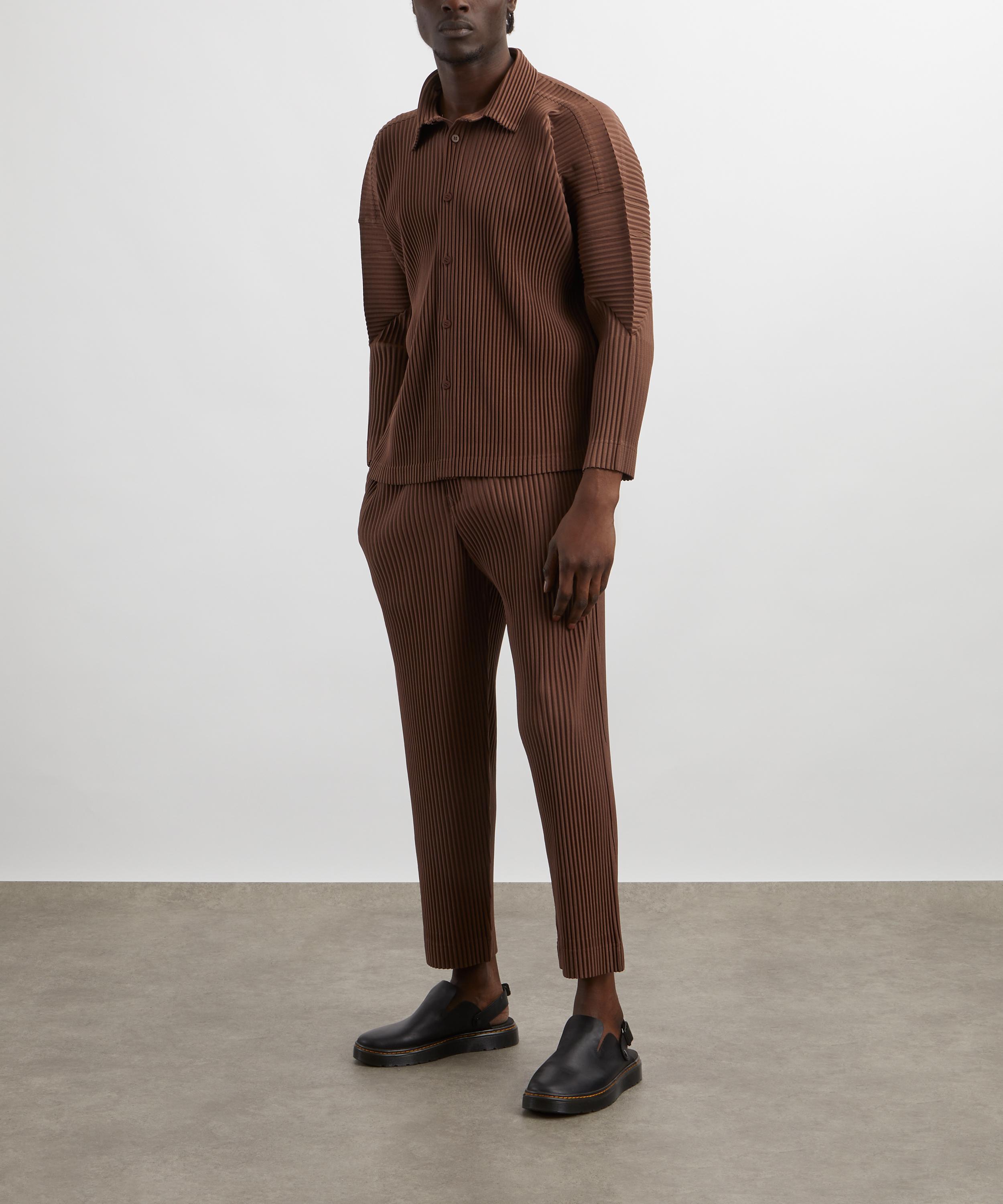 HOMME PLISSÉ ISSEY MIYAKE - MC NOVEMBER Slightly Tapered Trousers image number 1