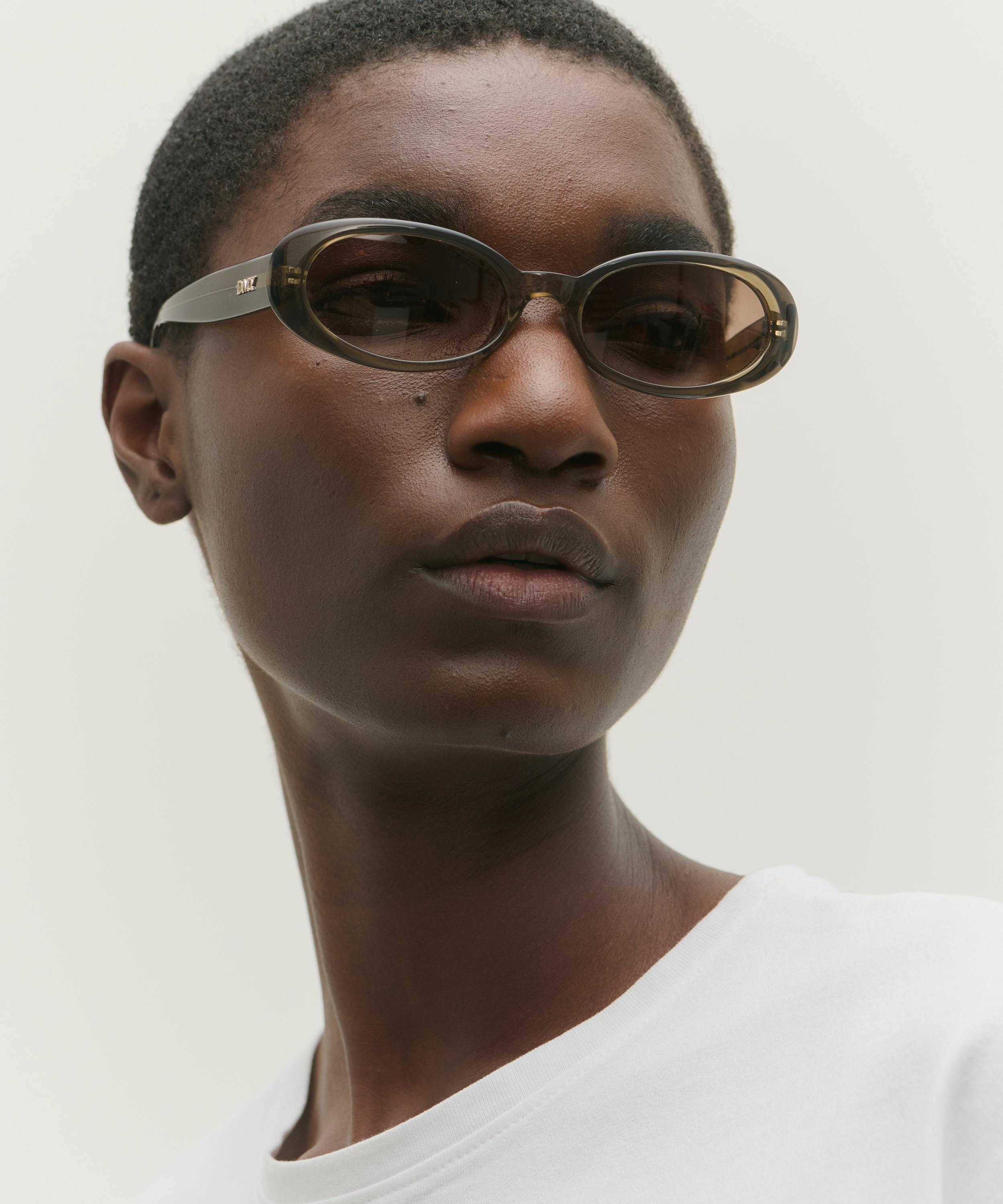 DMY Studios - Valentina Oval Transparent Olive Sunglasses image number 1