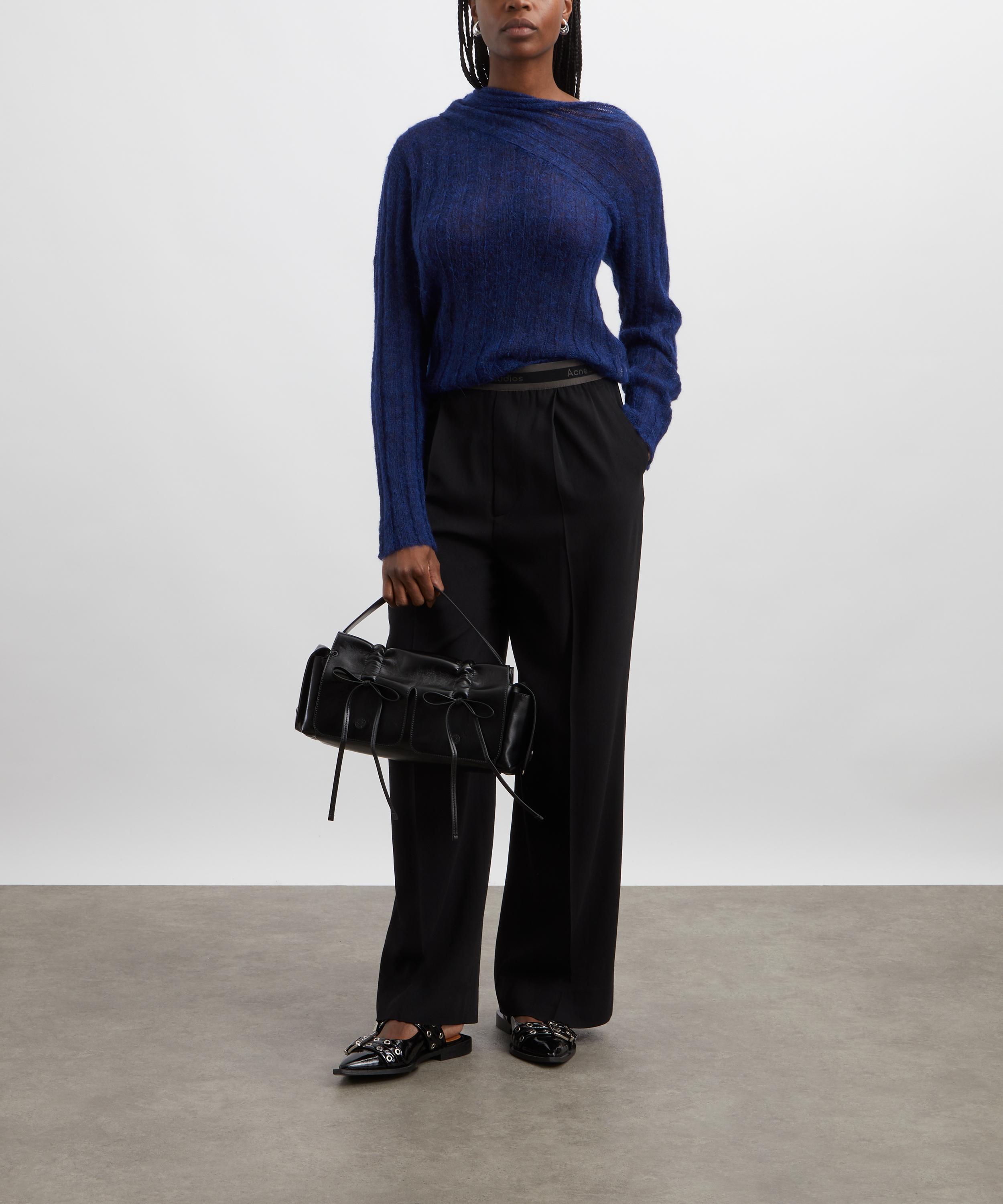 Acne Studios - Logo Tape Trousers image number 1