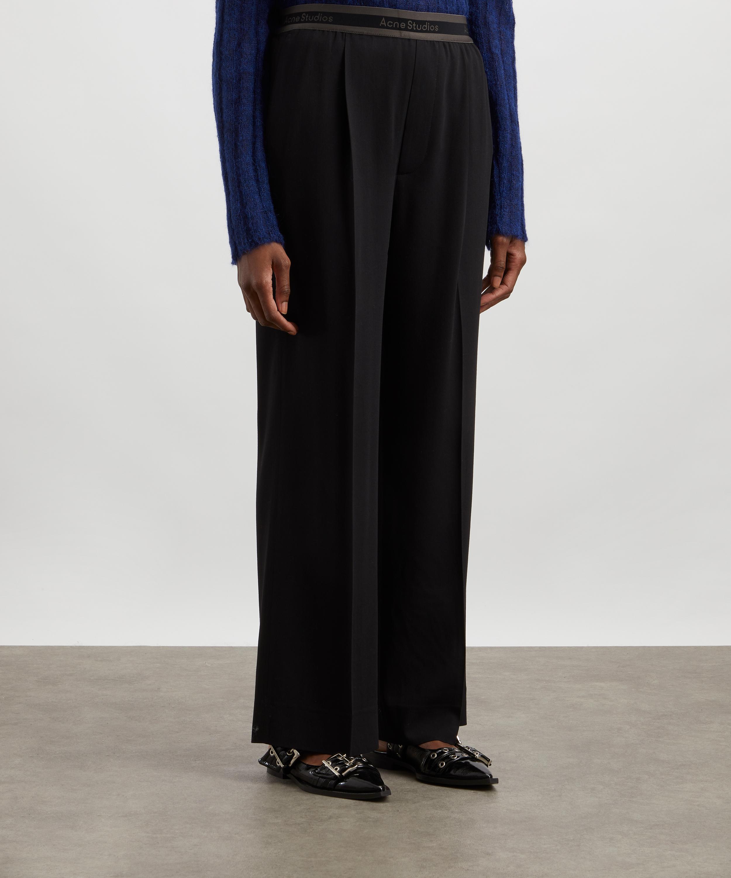 Acne Studios - Logo Tape Trousers image number 2