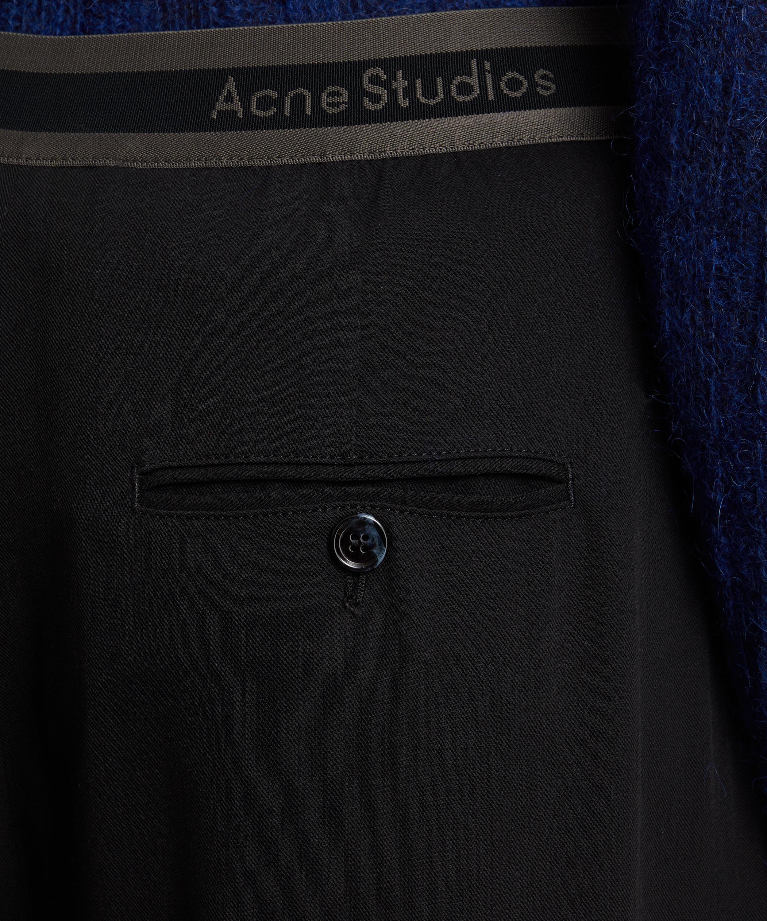 Acne Studios - Logo Tape Trousers image number 4