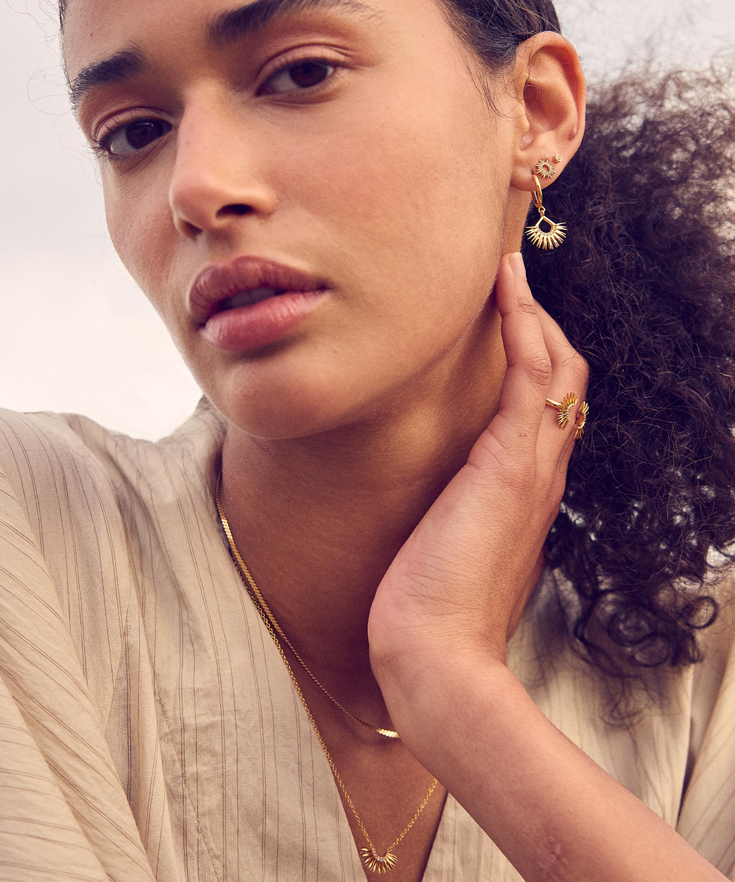 Rachel Jackson - 22ct Gold-Plated Rising Sun Birthstone Huggie Hoop Earrings image number 1