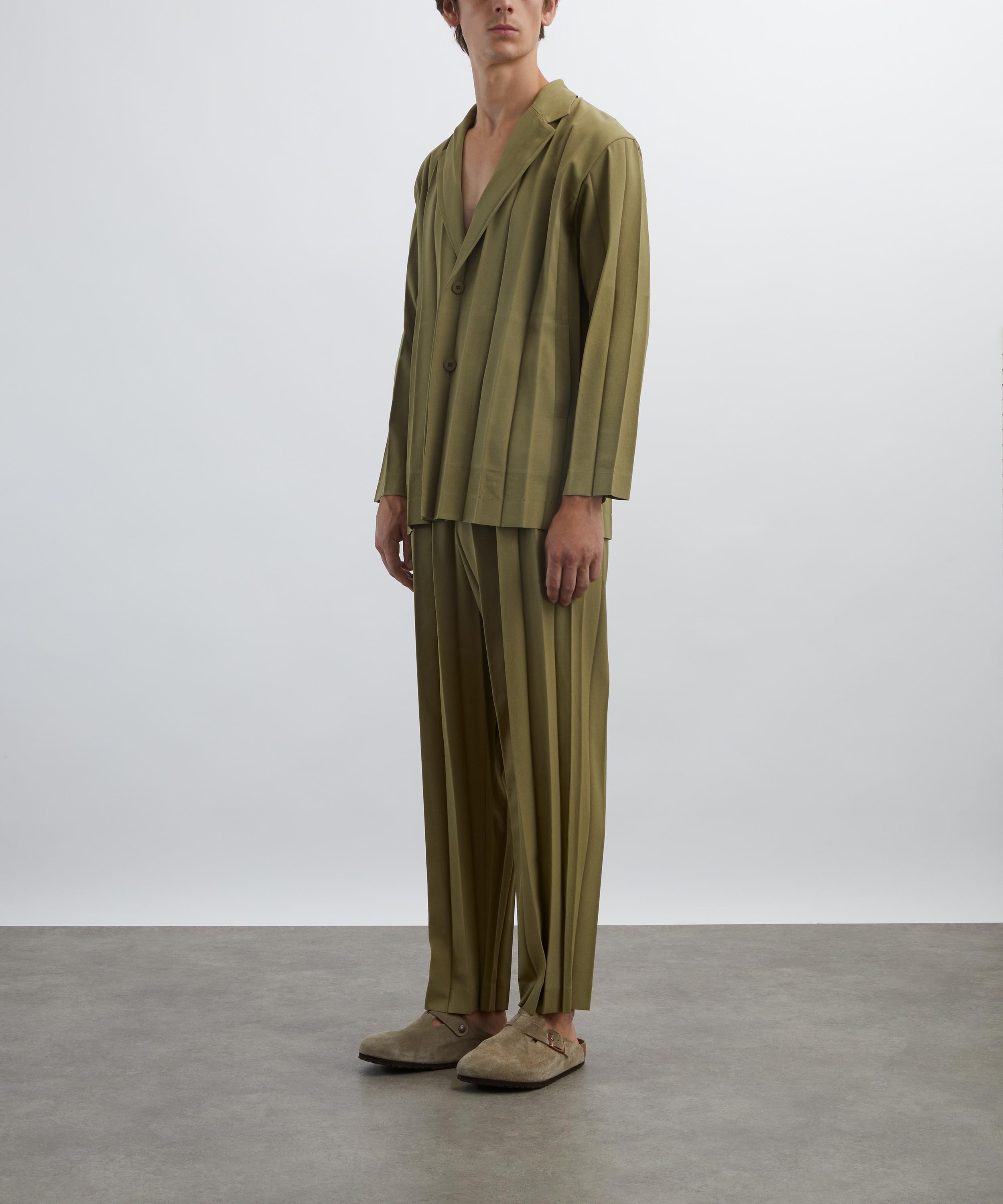 HOMME PLISSÉ ISSEY MIYAKE - EDGE ENSEMBLE Khaki Pleated Trousers image number 1
