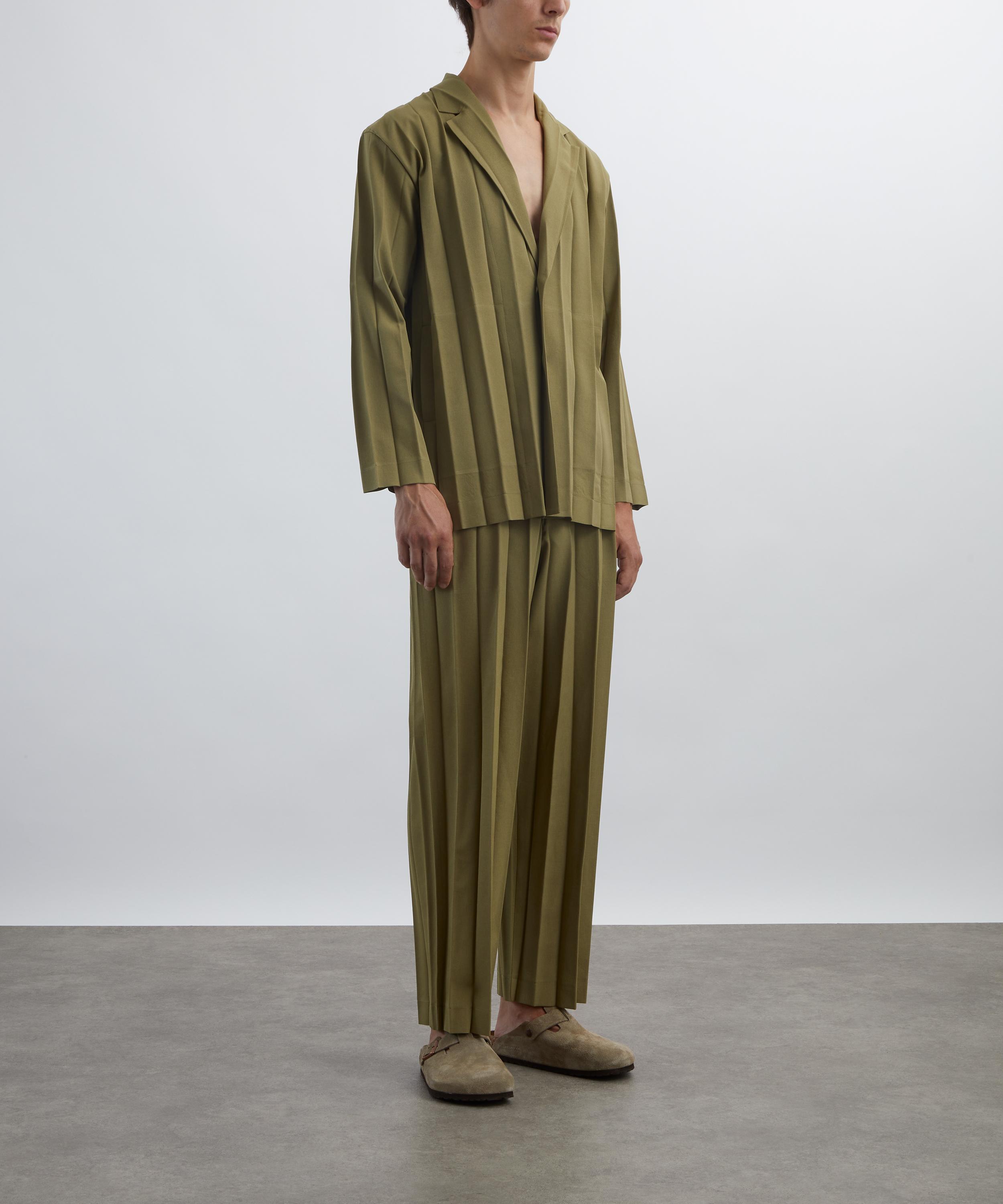 HOMME PLISSÉ ISSEY MIYAKE - EDGE ENSEMBLE Khaki Pleated Jacket image number 1