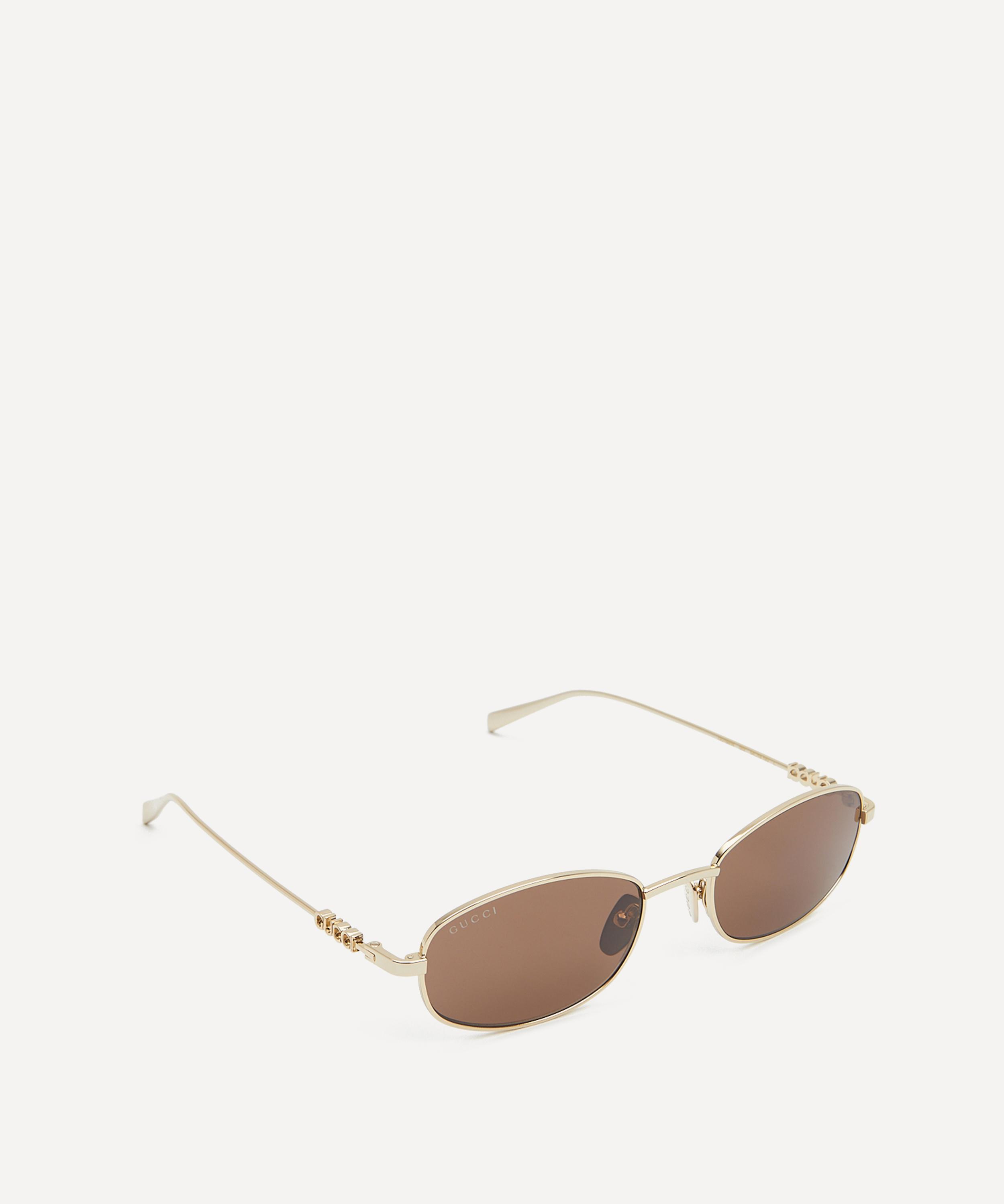 Gucci - Oval Metal Cut-Out Logo Sunglasses image number 1