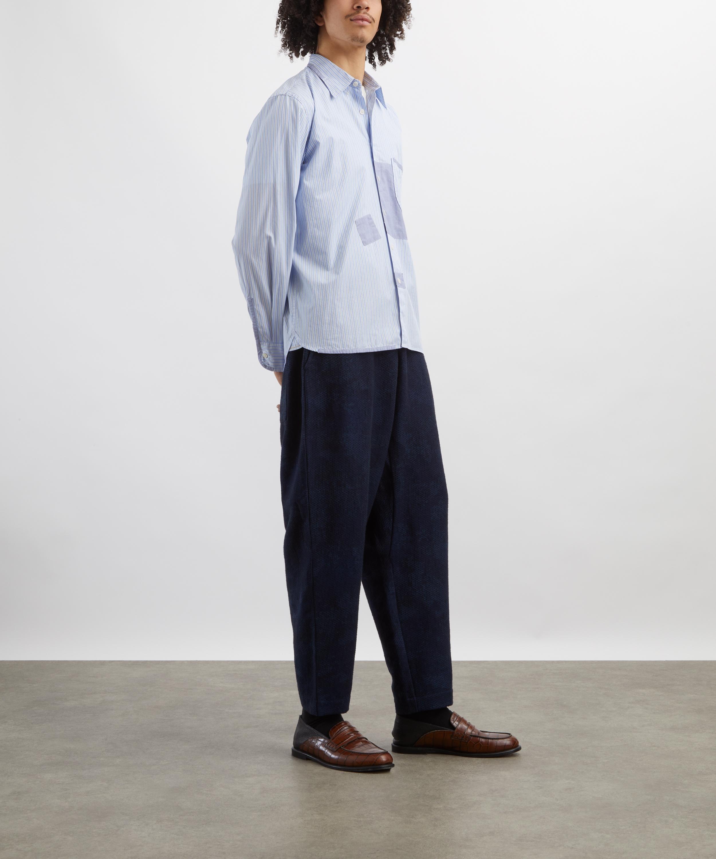 Universal Works - Black-Indigo Denim Camo Braga Trousers image number 1