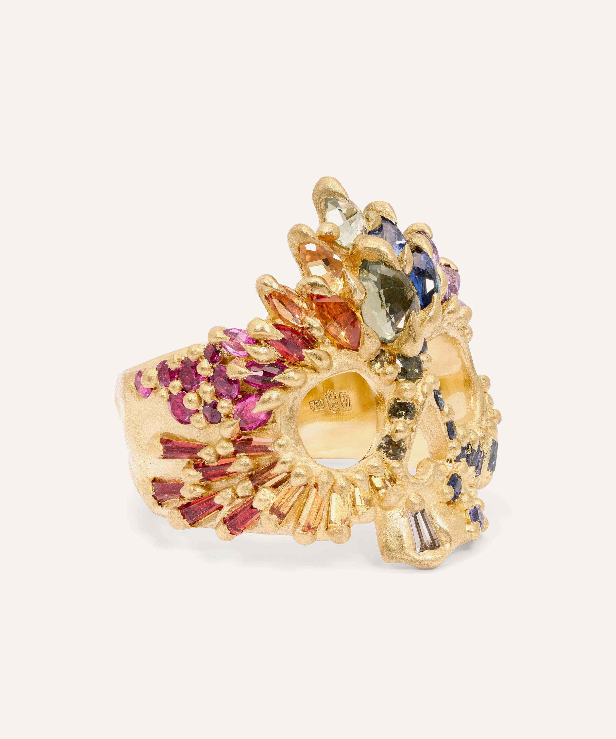 Polly Wales - 18ct Gold Rainbow Arcus Sapphire Skull Ring image number 1