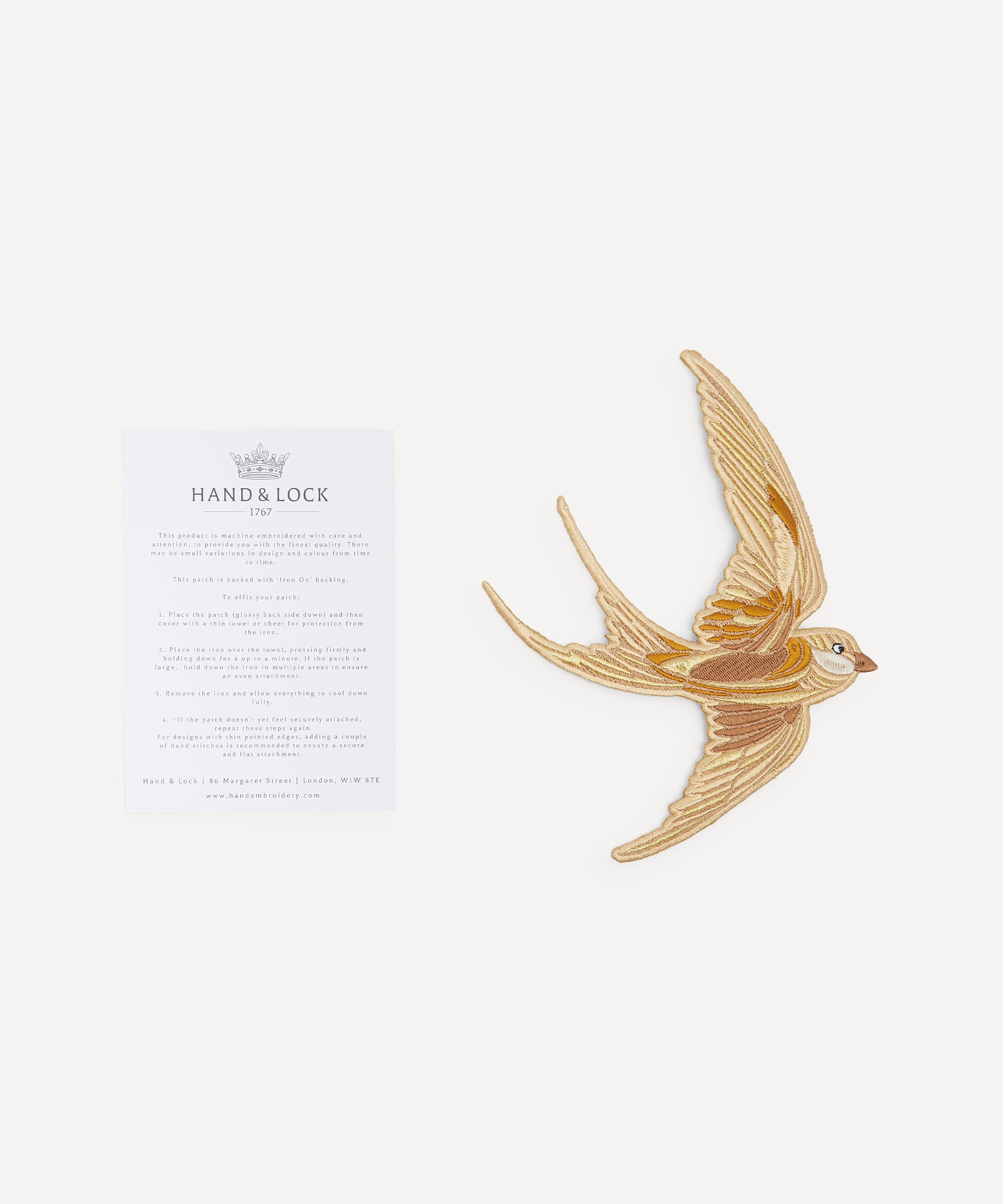 Hand and Lock - Golden Swallow Machine Patch image number 1