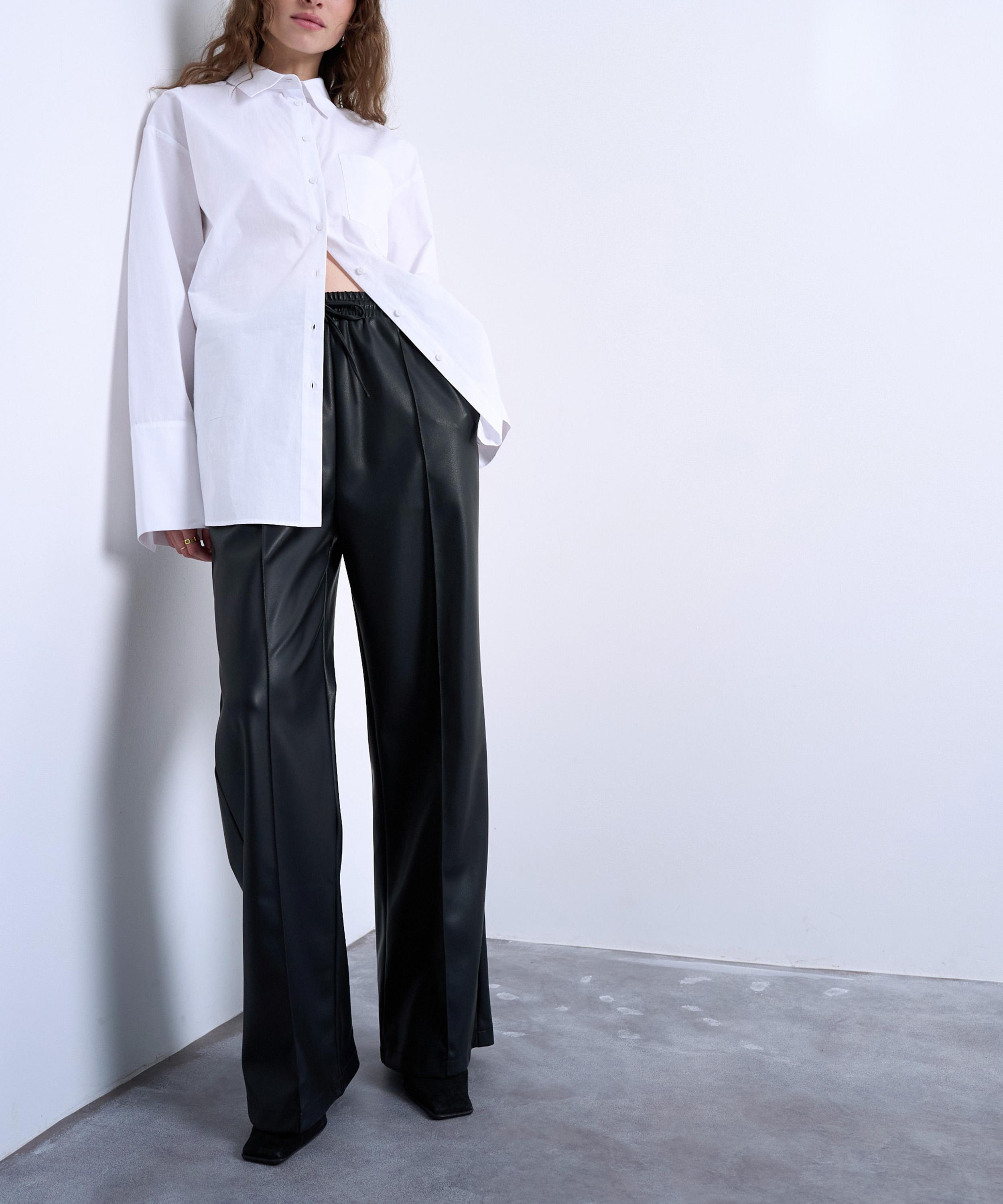 TOPSHOP - Black Faux Leather Wide Leg Joggers with Pinseam Detail image number 1