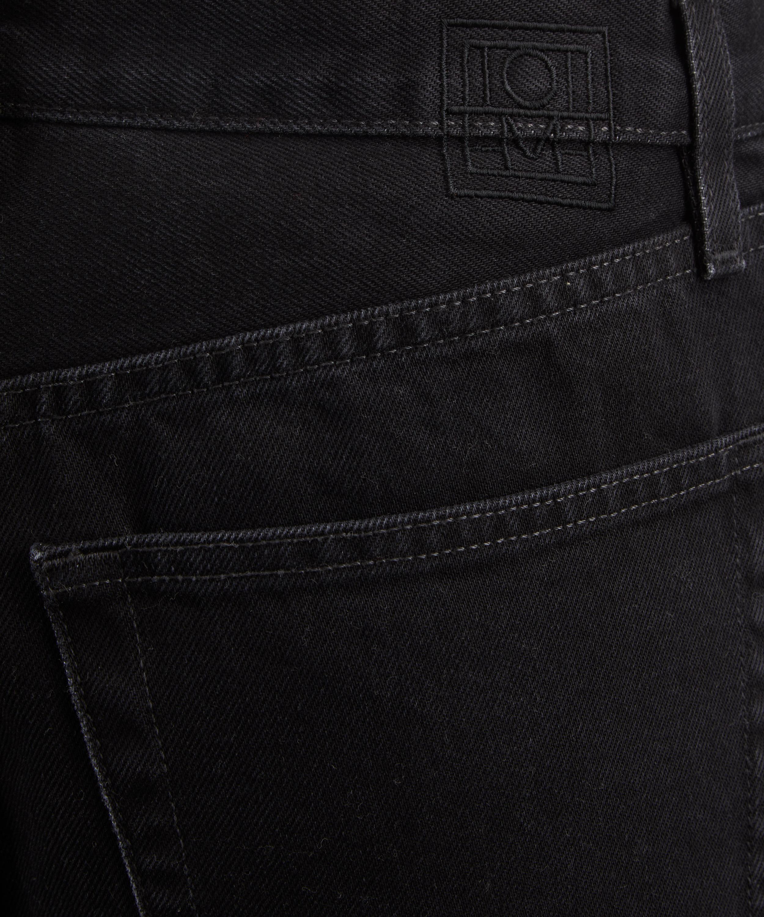 Toteme - Twisted Seam Denim Jeans in Washed Black image number 4