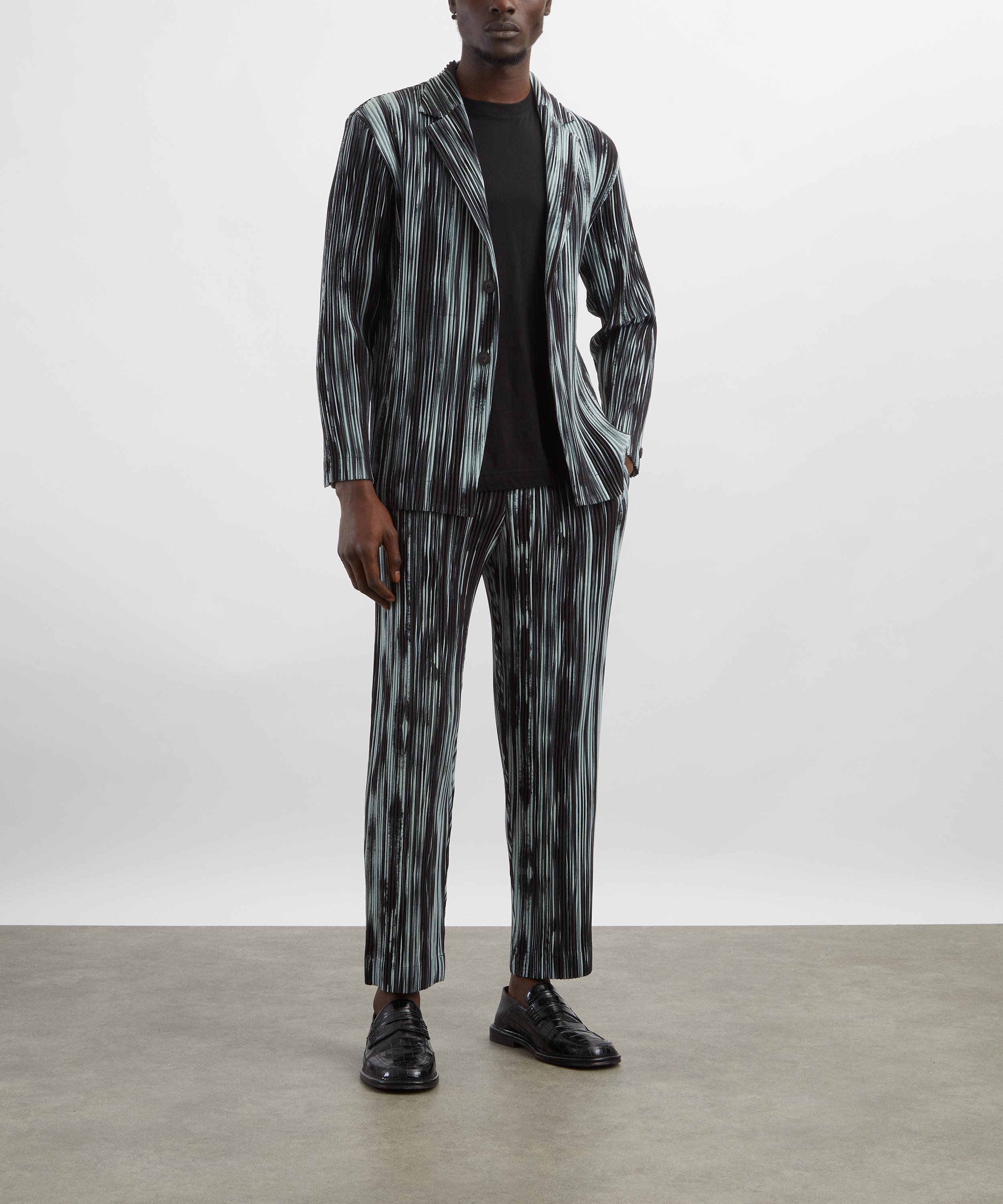 HOMME PLISSÉ ISSEY MIYAKE - BRUSHSTROKE STRIPE Pleated Trousers image number 1