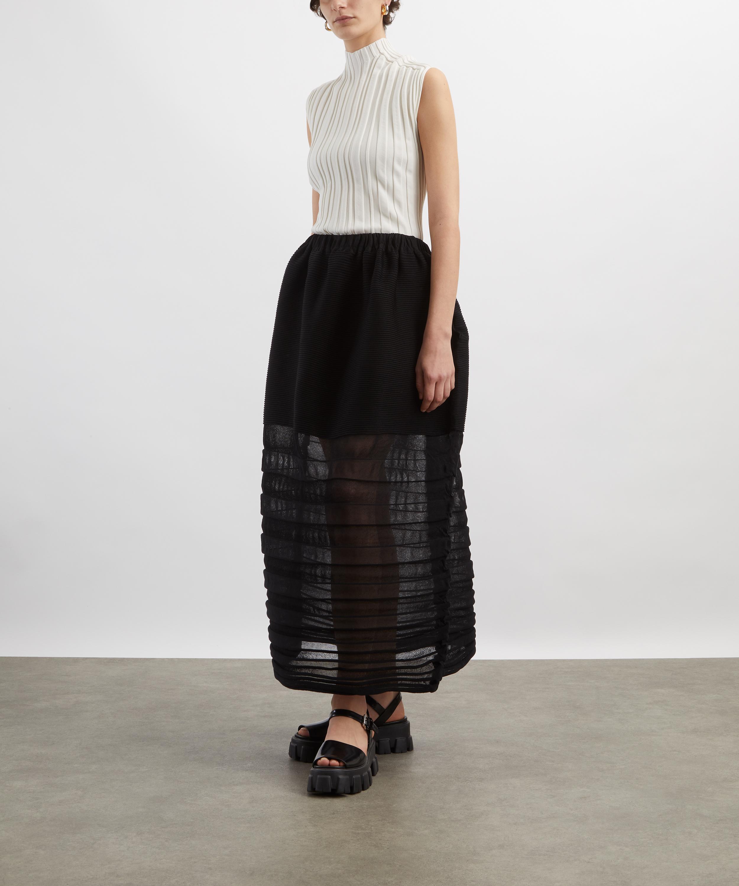 Issey Miyake - Black MOVING KNIT Midi Skirt image number 1