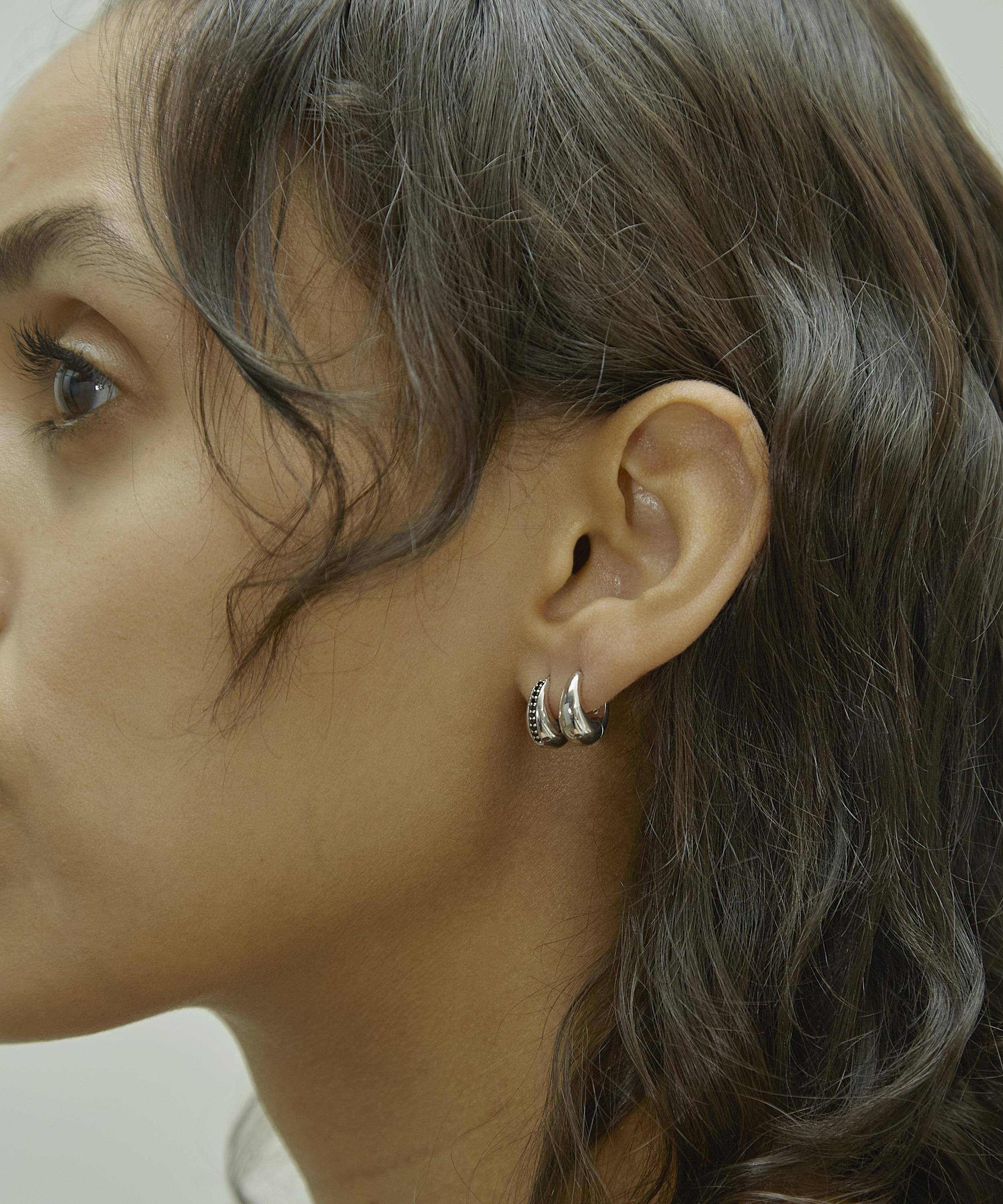 Otiumberg - Sterling Silver Mini Graduated Hoop Earrings image number 1