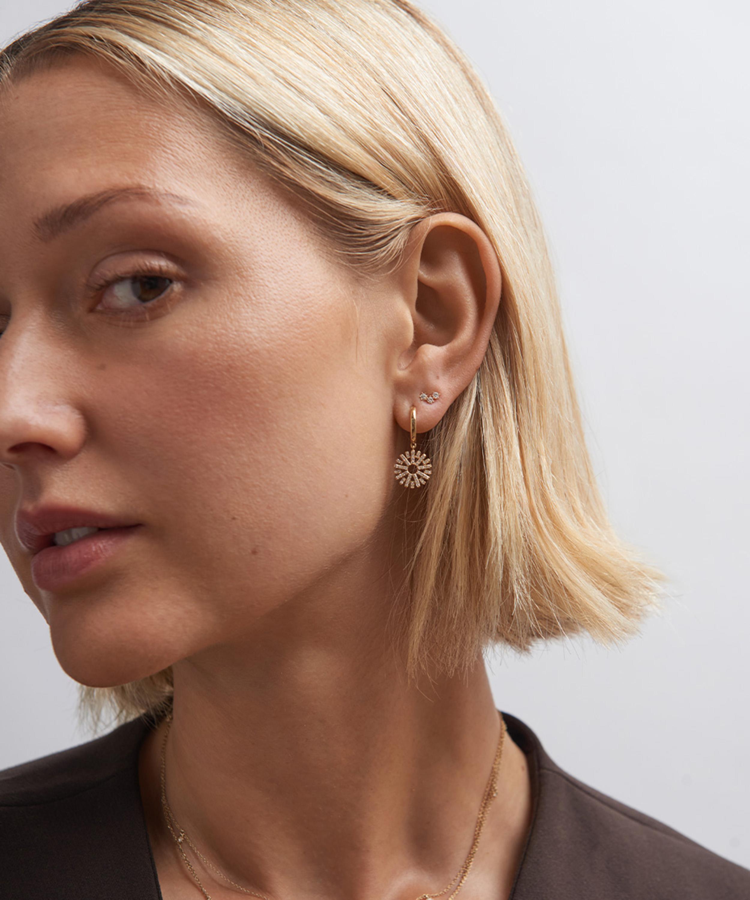 Astley Clarke - 14ct Gold Rising Sun Huggie Hoop Earrings image number 1