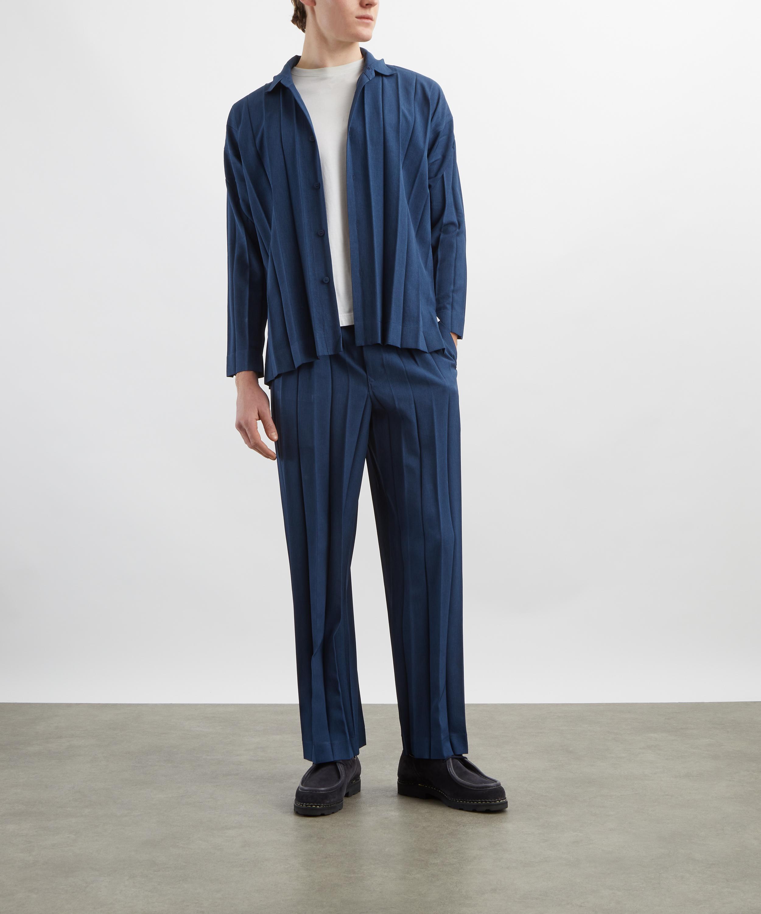 HOMME PLISS&Eacute; ISSEY MIYAKE - EDGE ENSEMBLE Navy Trousers image number 1