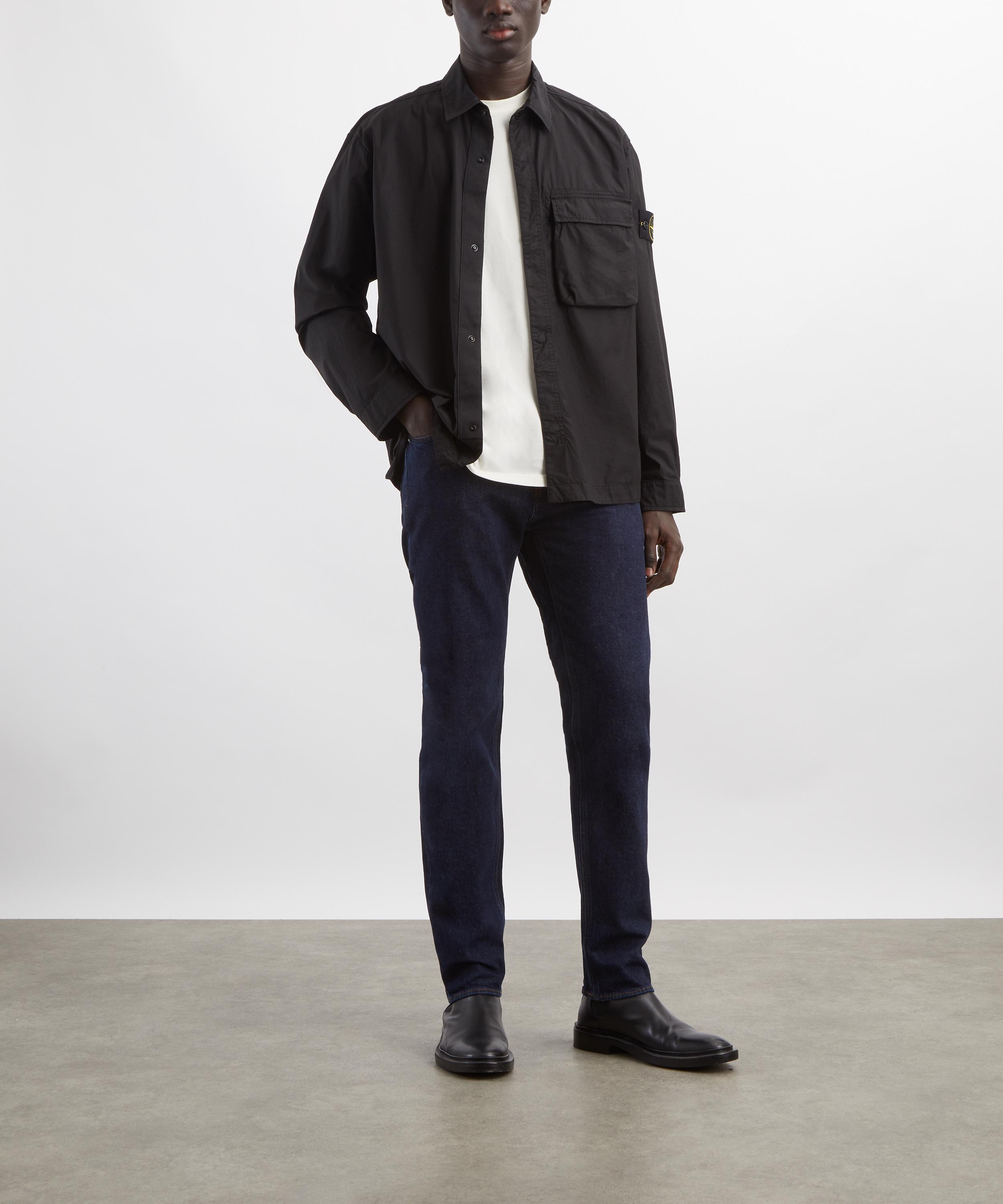 Stone Island - Stretch Indigo Loose-Fit Jeans in Blue Rinsed&nbsp; image number 1