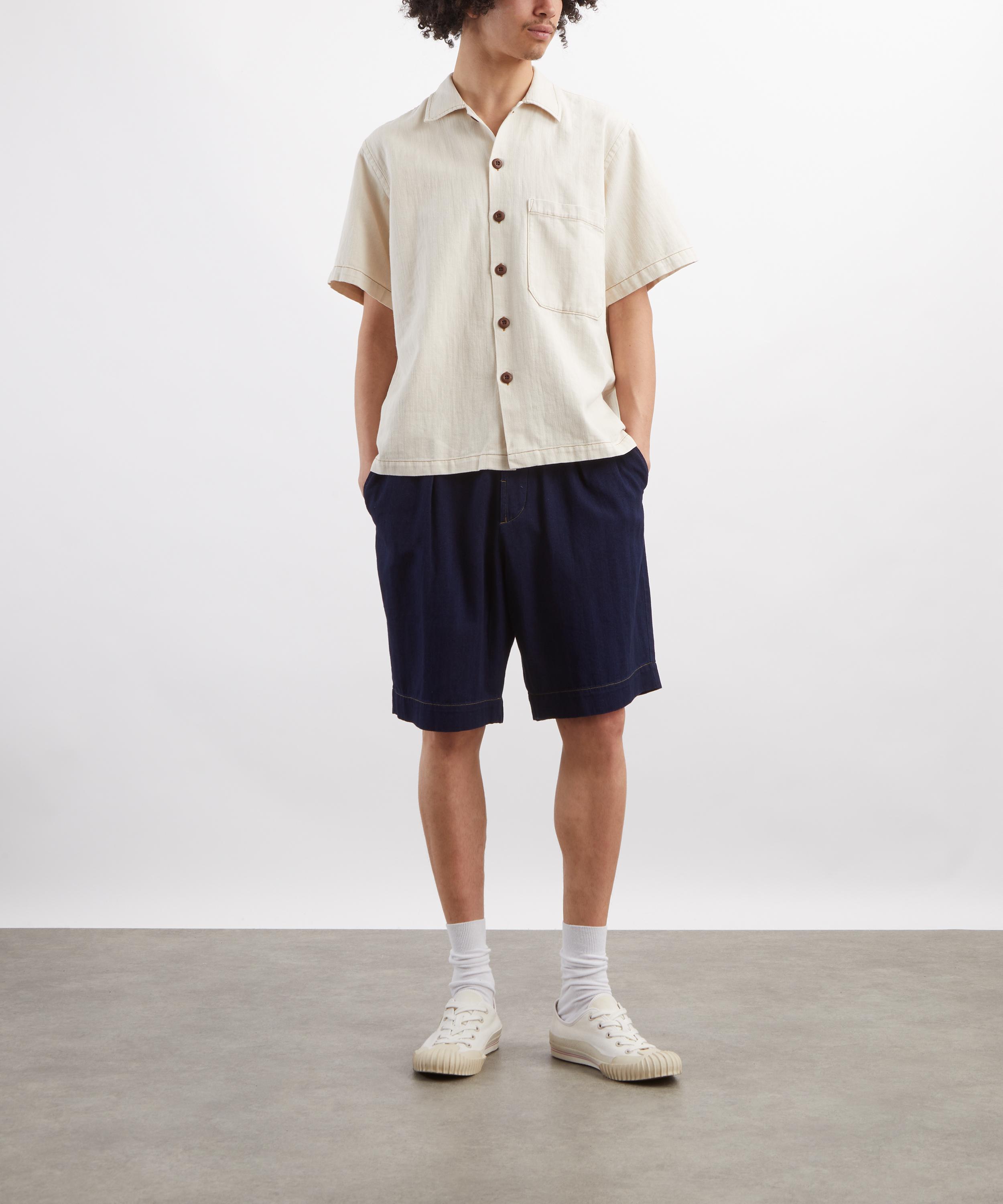 Universal Works - Indigo Herringbone Pleated Track Shorts image number 1