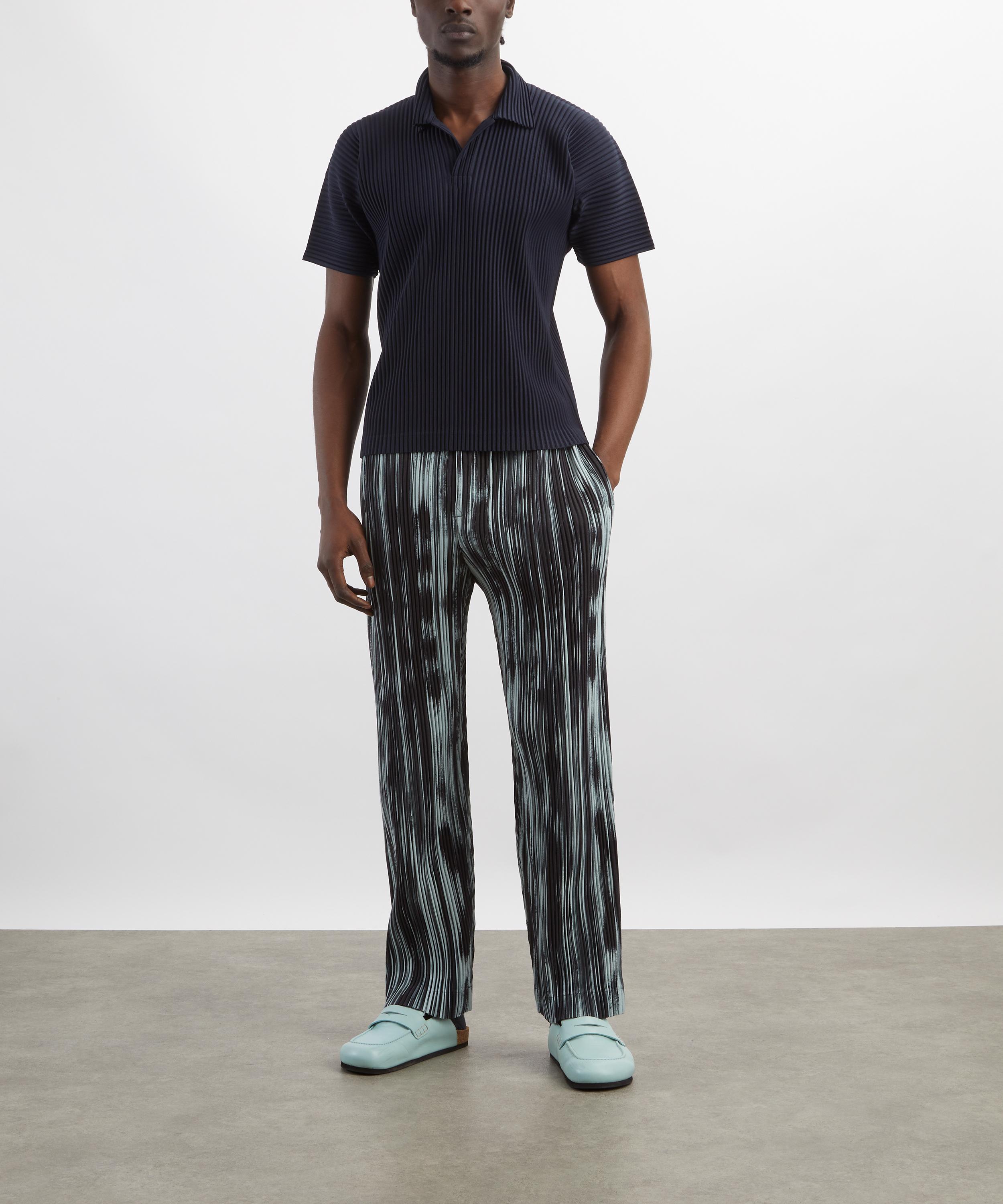 HOMME PLISS&Eacute; ISSEY MIYAKE - BASICS Navy Pleated Polo Shirt image number 1