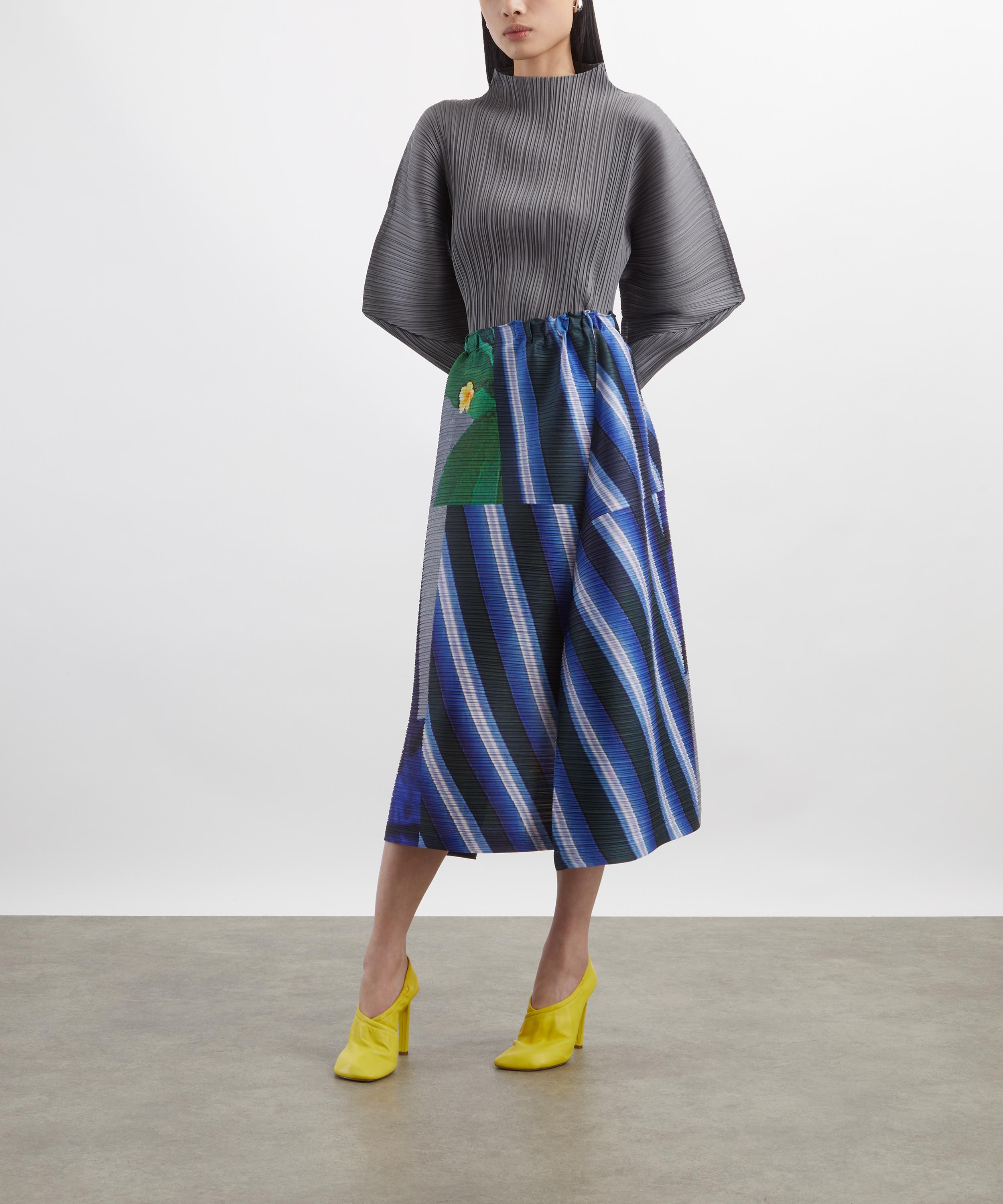 Pleats Please Issey Miyake - CITY COLLAGE Pleated Midi Skirt image number 1