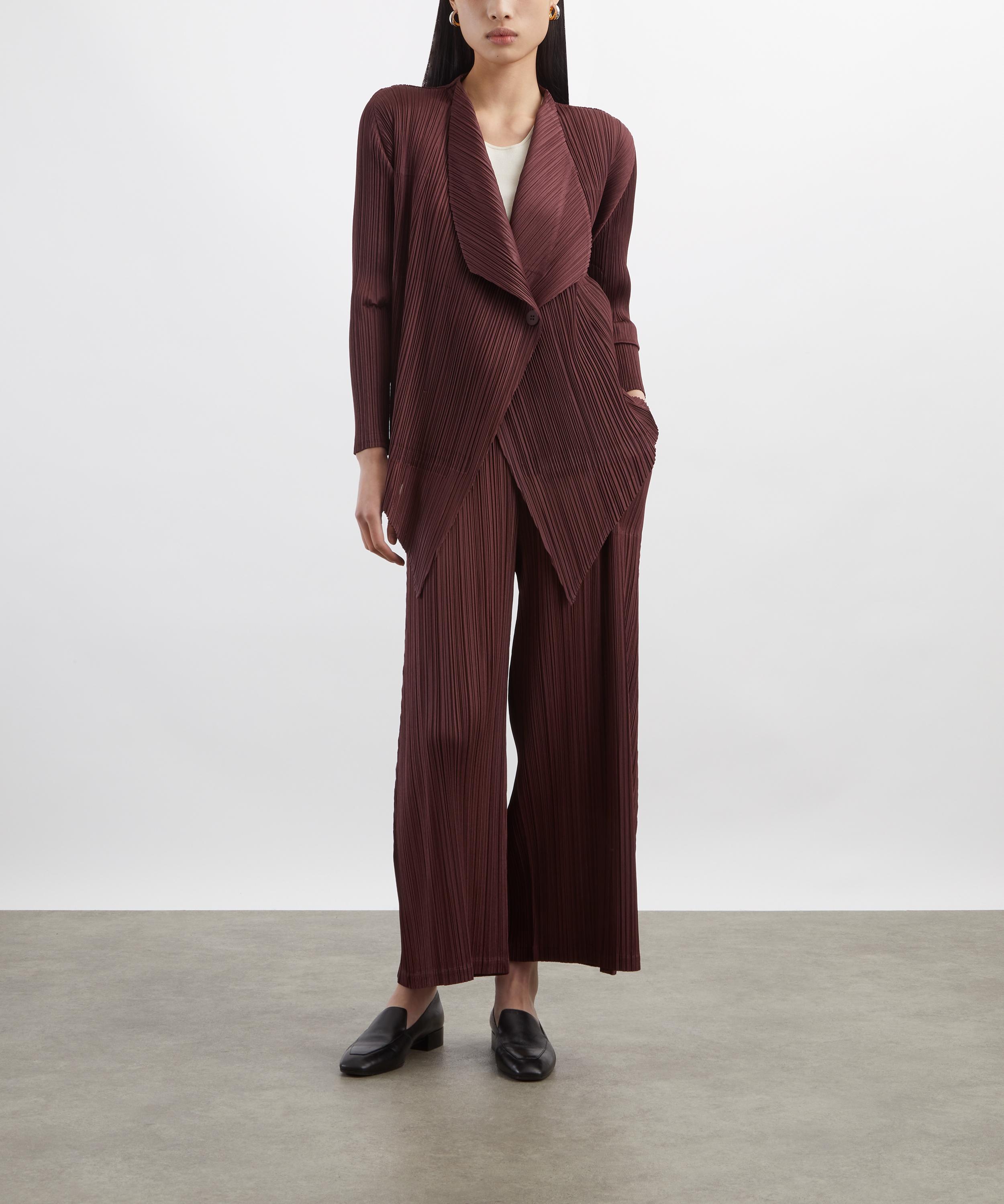 Pleats Please Issey Miyake - MONTHLY COLOURS: JANUARY Pleated Wide-Leg Trousers image number 1