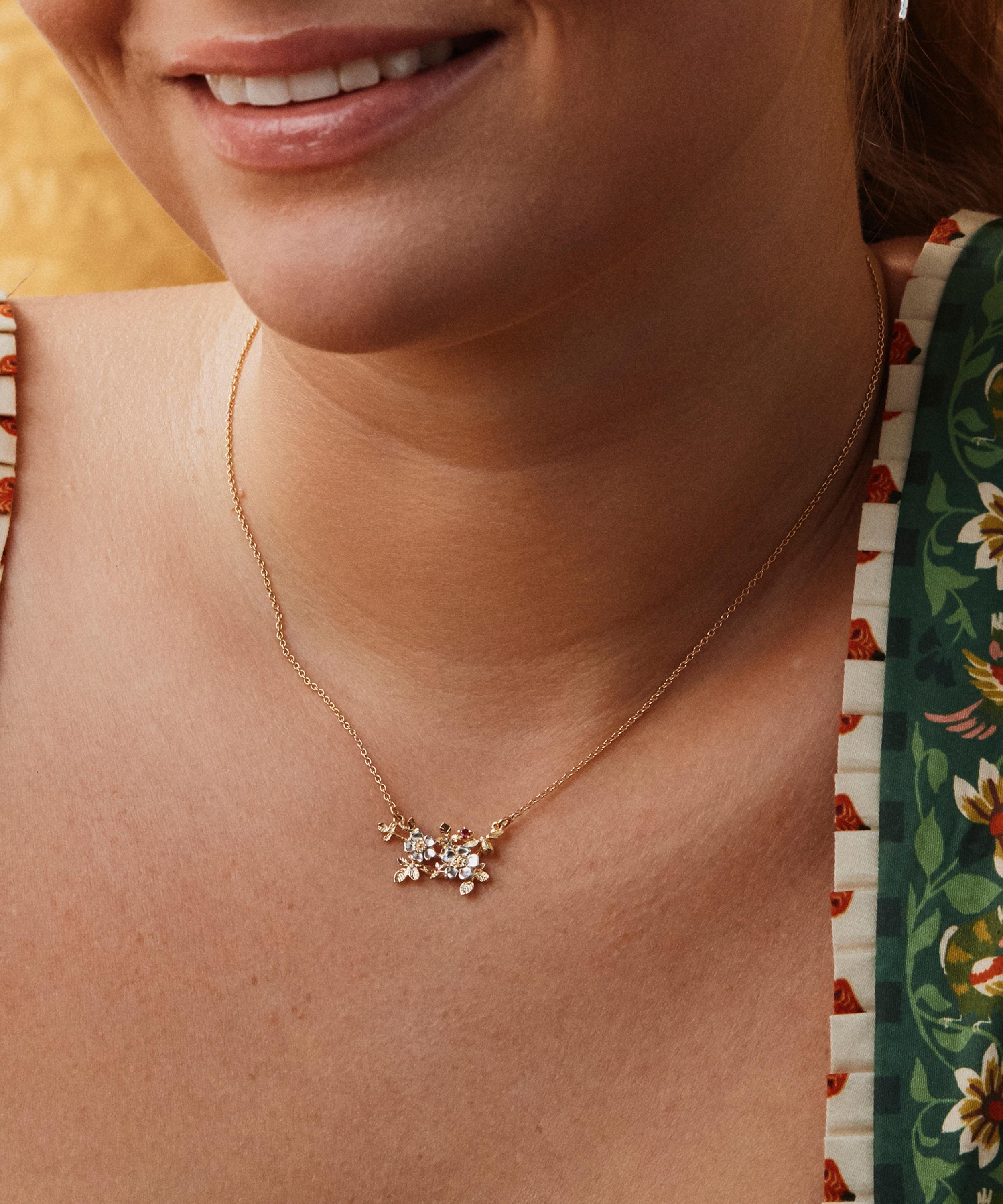 Alex Monroe - 22ct Gold-Plated Inline Wild Rose and Bee Ruby Pendant Necklace image number 1