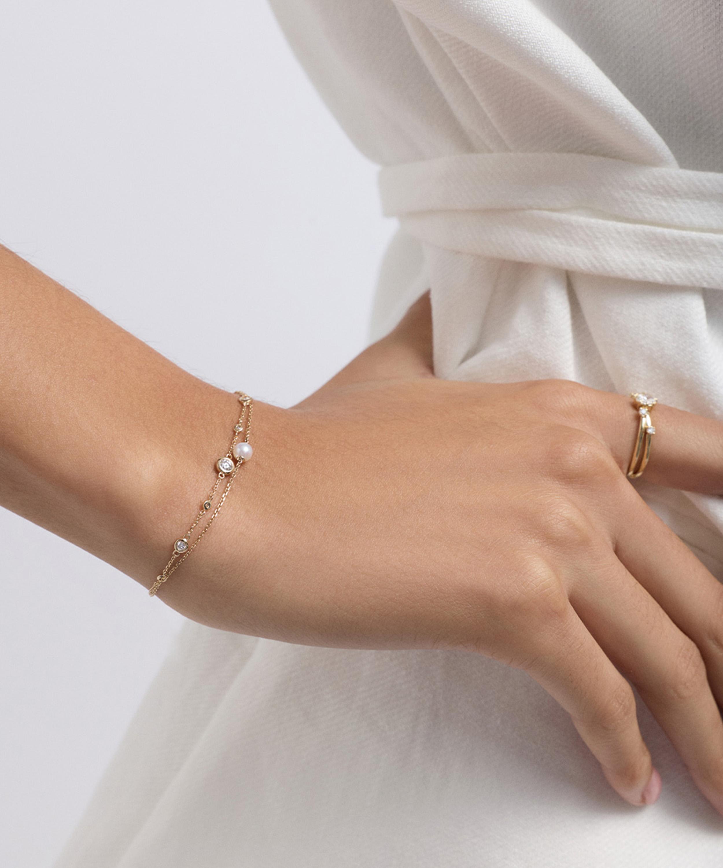 Astley Clarke - 14ct Gold Luna Mini Pearl Bracelet image number 1