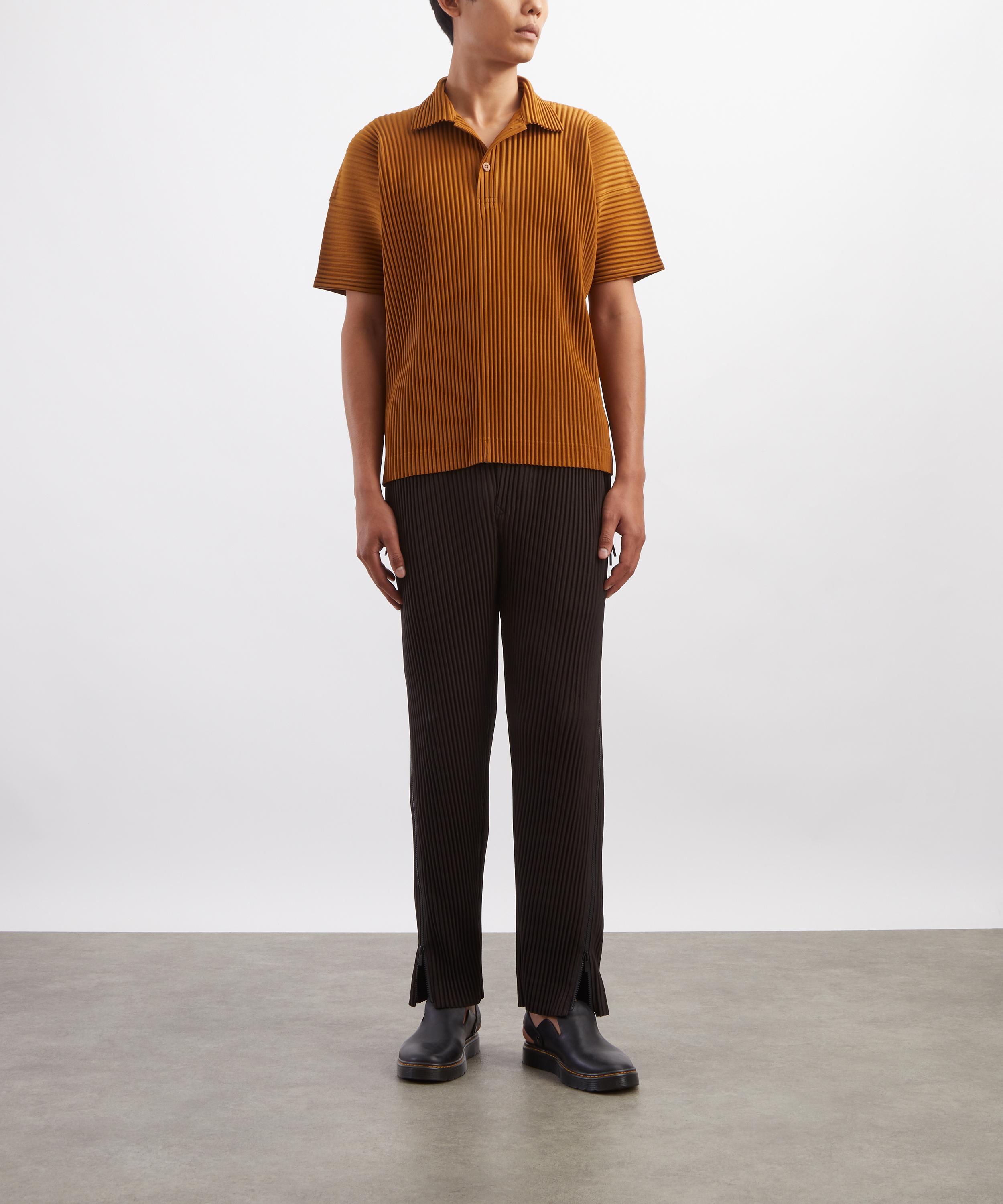 HOMME PLISS&Eacute; ISSEY MIYAKE - MULTI-FASTENED Pleated Straight-Leg Trousers image number 1