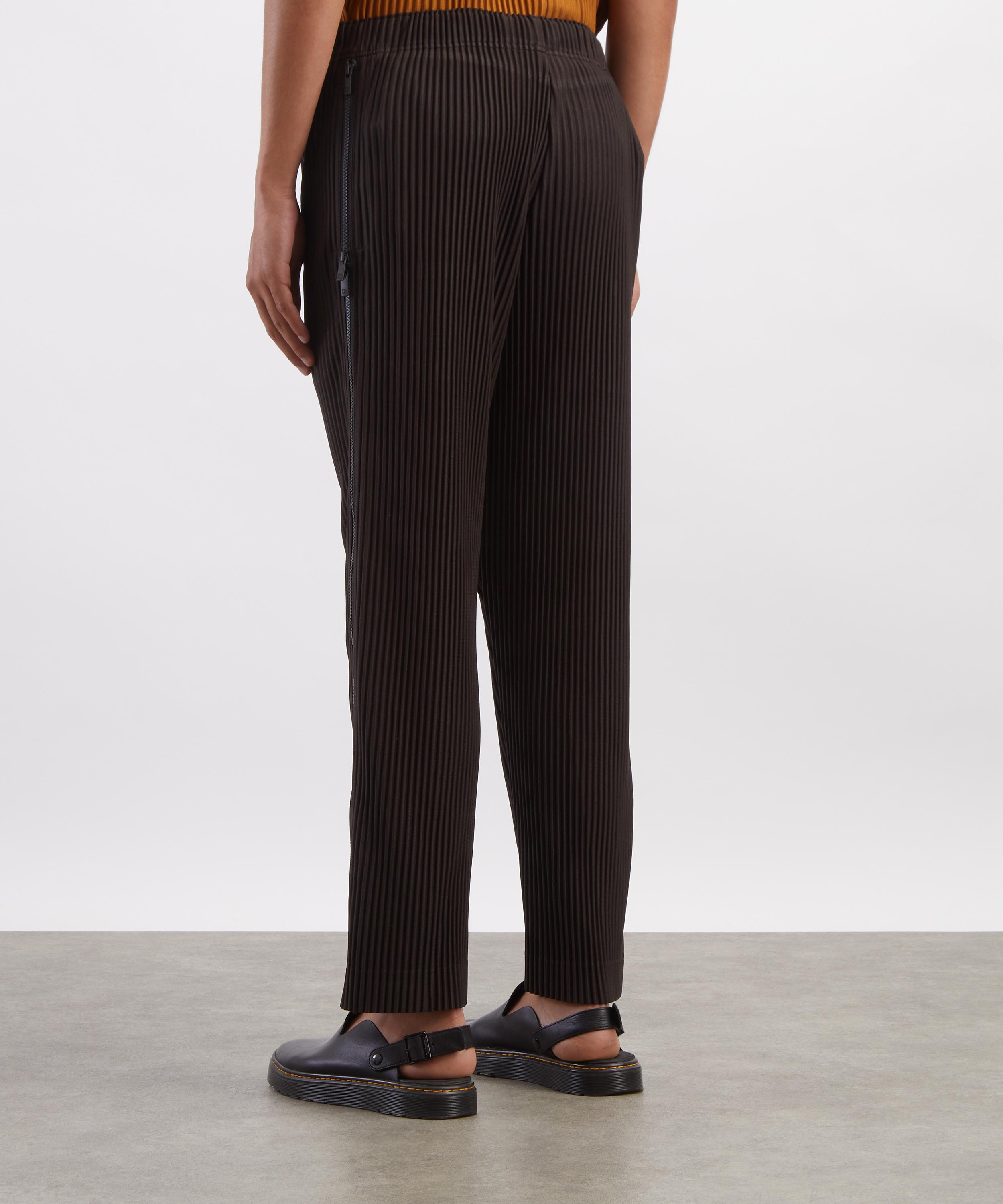 HOMME PLISS&Eacute; ISSEY MIYAKE - MULTI-FASTENED Pleated Straight-Leg Trousers image number 3